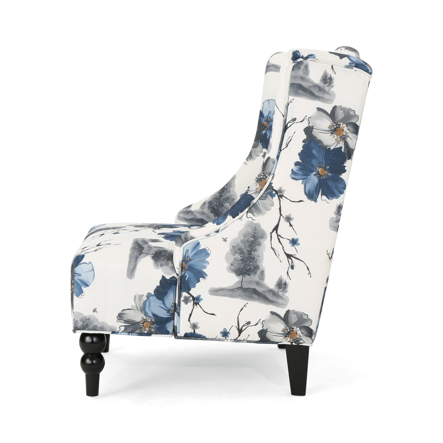 Wingback accent chair with blue floral pattern and carved wooden legs