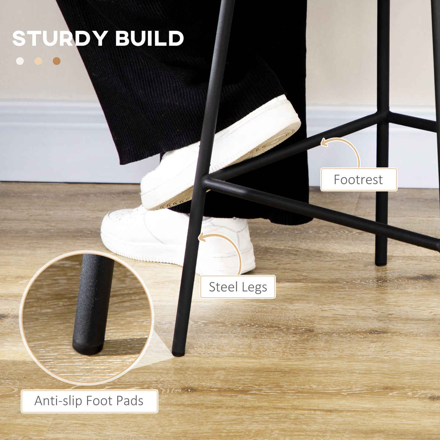 Black steel legs with antislip foot pads for a stable bar stool
