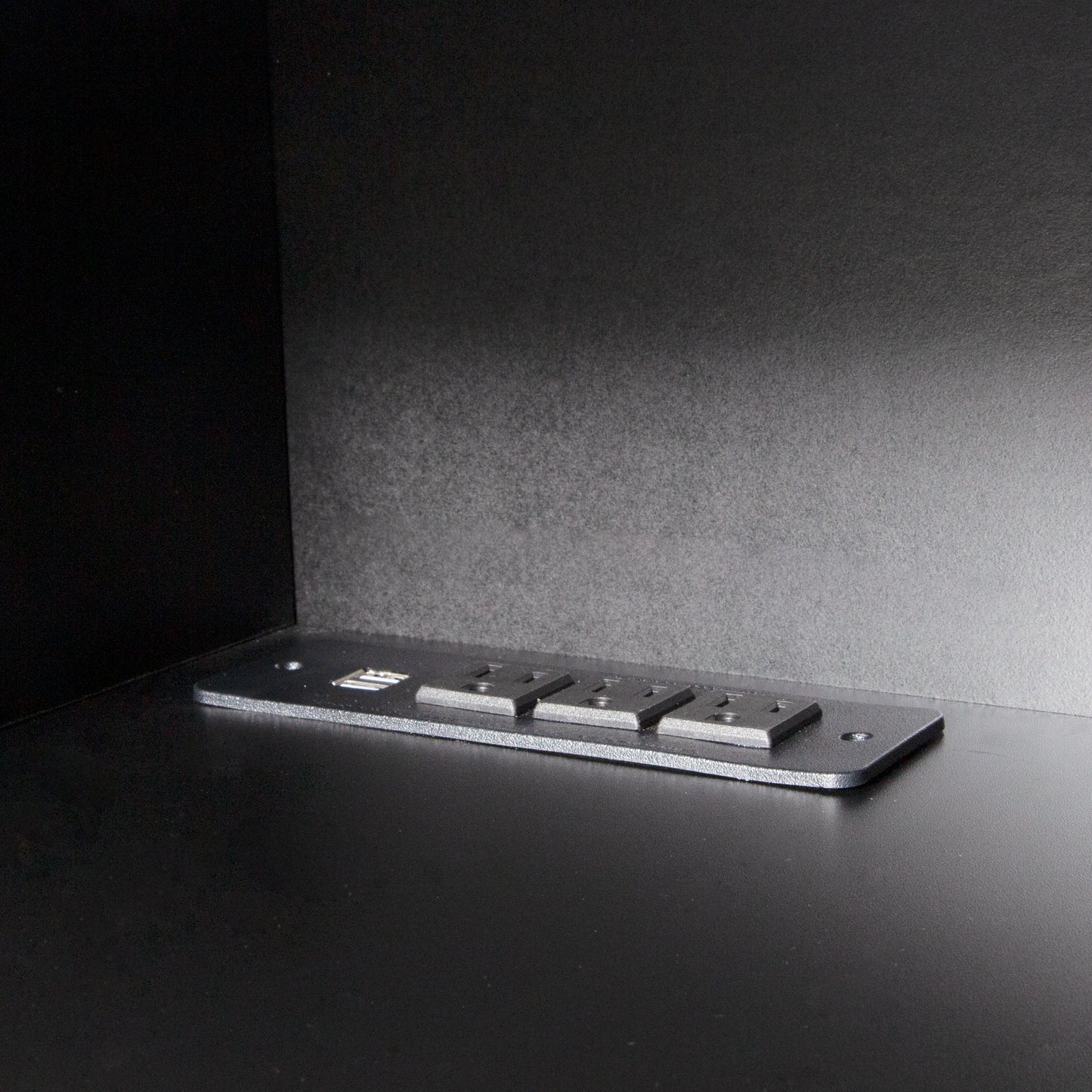 Black power strip with USB ports and outlets for home office charging