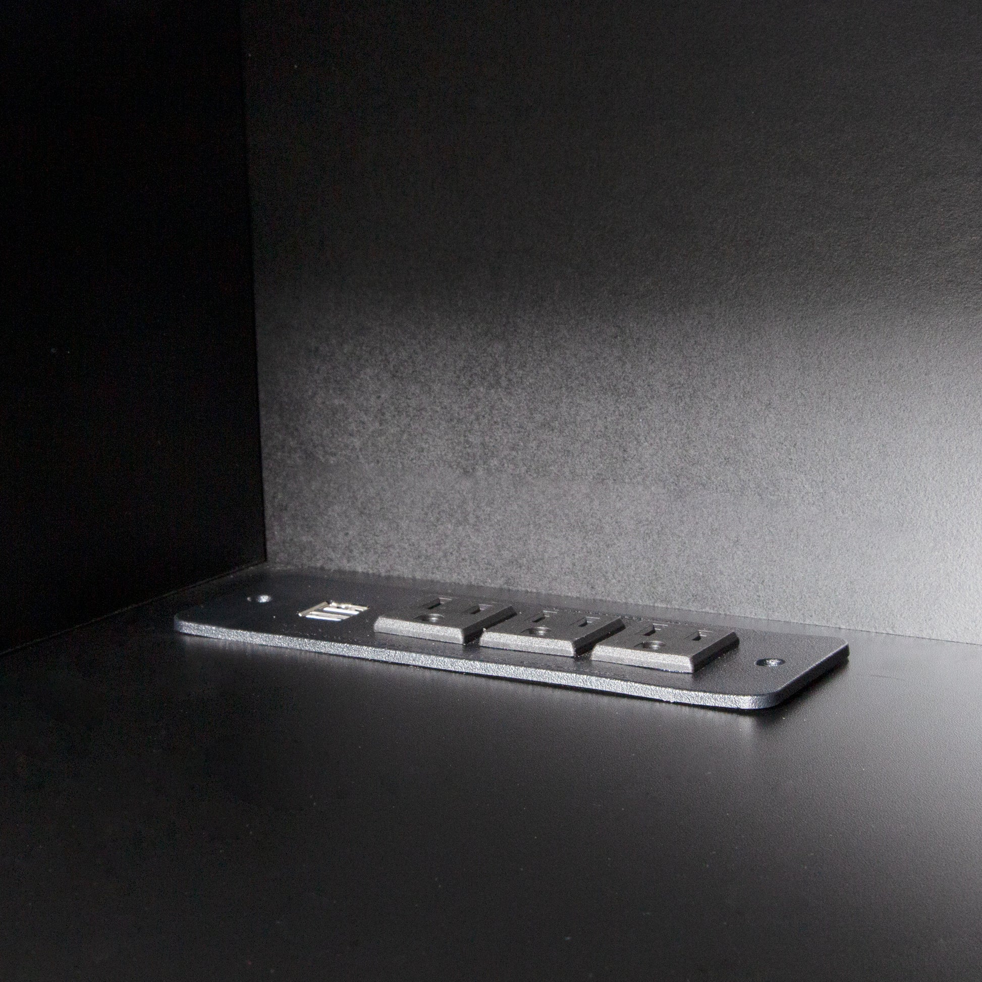 Black power strip with USB ports and outlets for home office charging