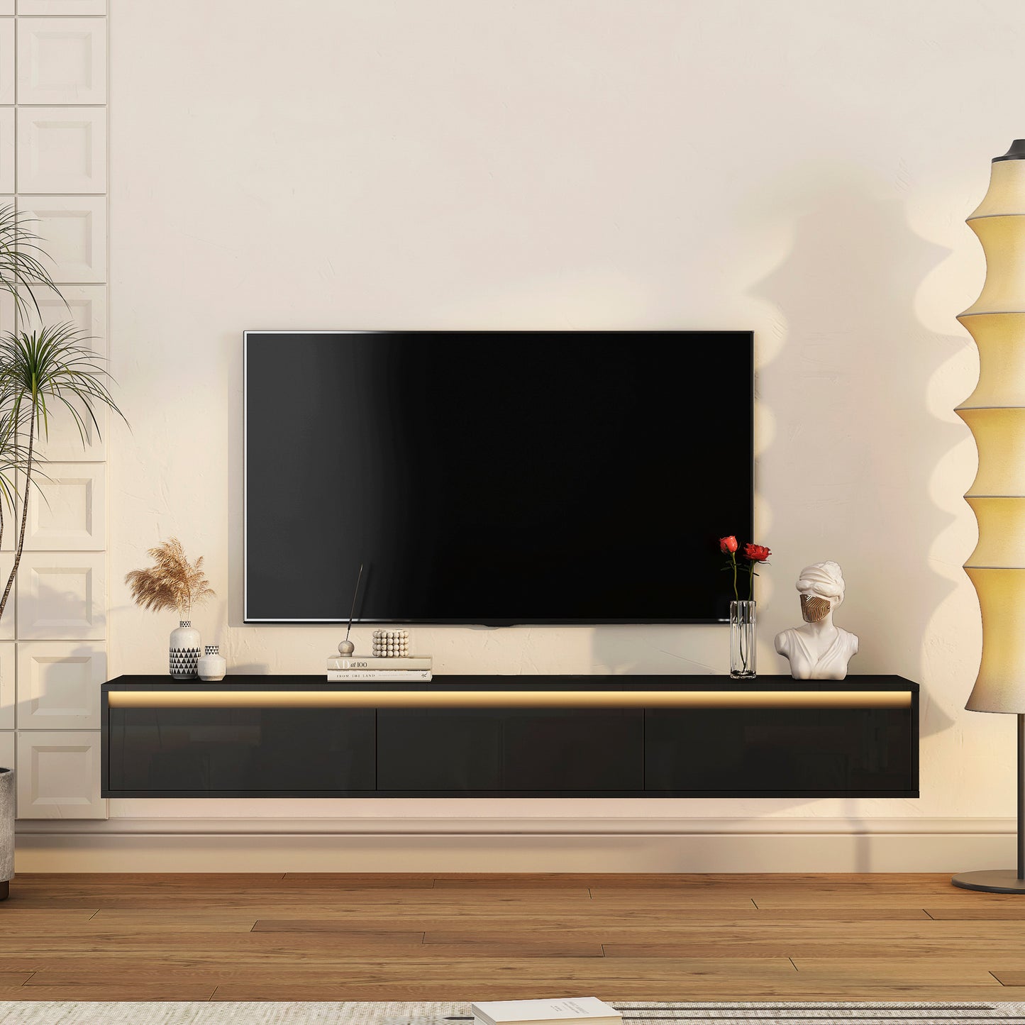 Modern black floating media console with LED accent lighting and minimalist design