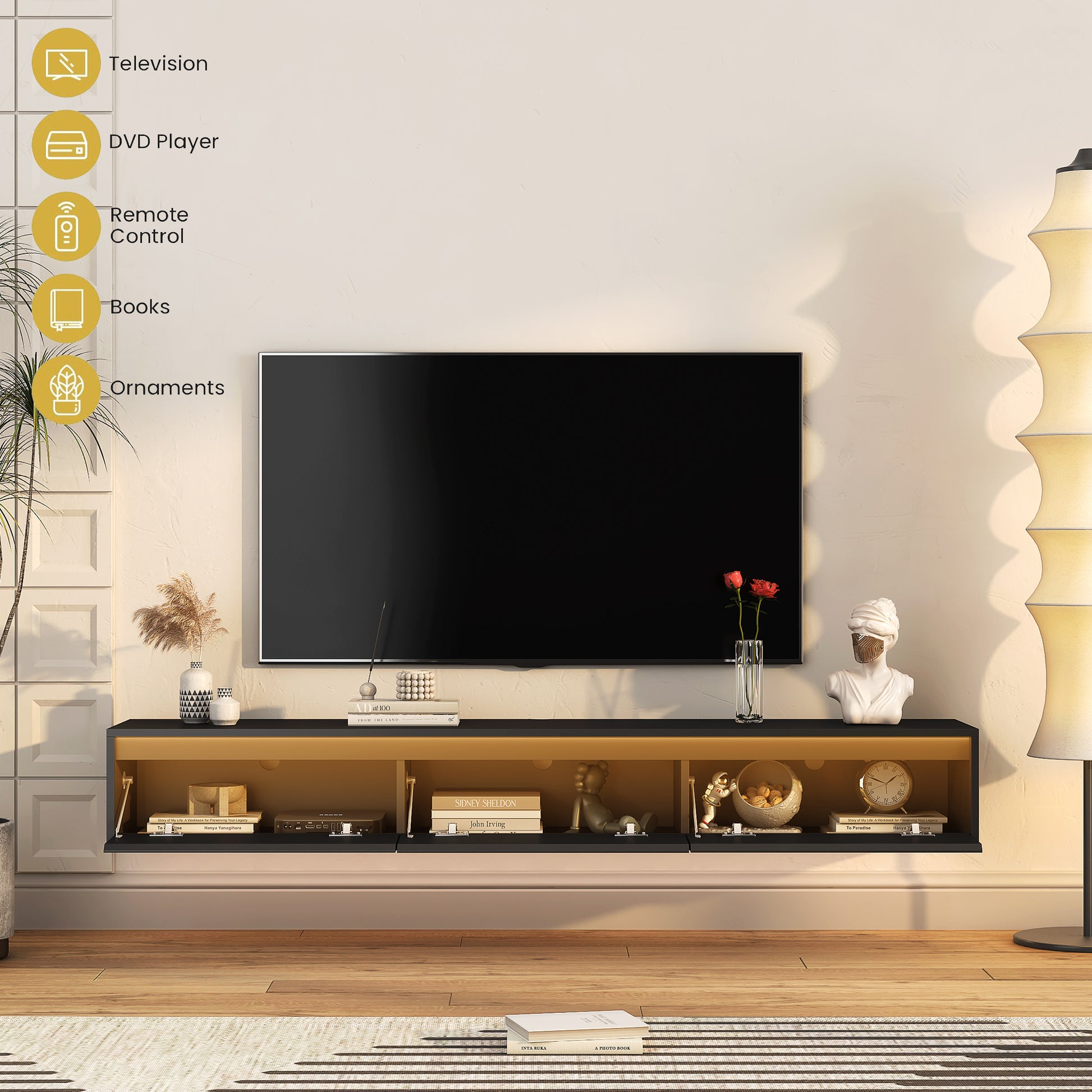 Wallmounted media console in black and gold with modern sculptures and plants