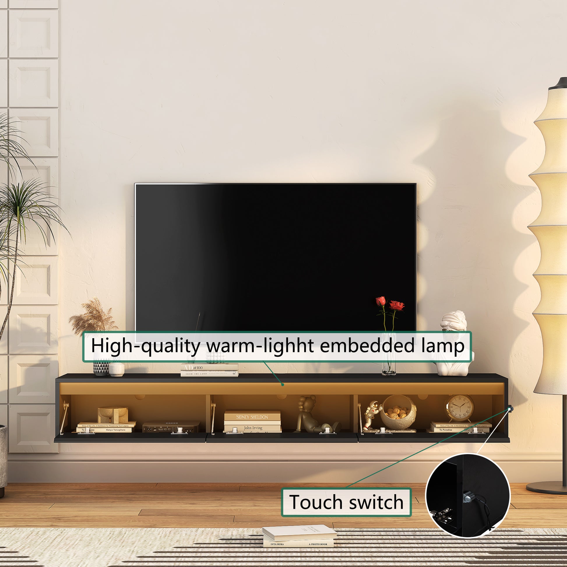 Floating black media console with warm embedded lighting and touch switch operation
