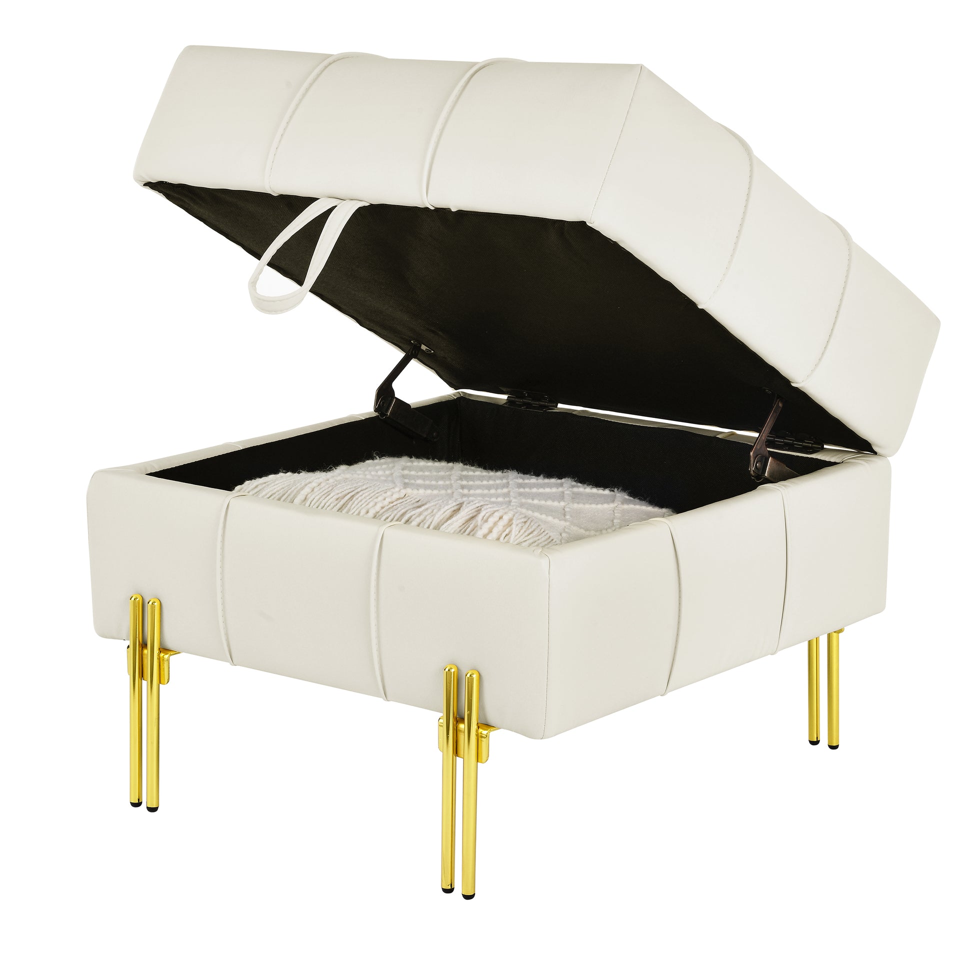 Cream faux leather storage ottoman with tufted design and gold legs open revealing a blanket inside