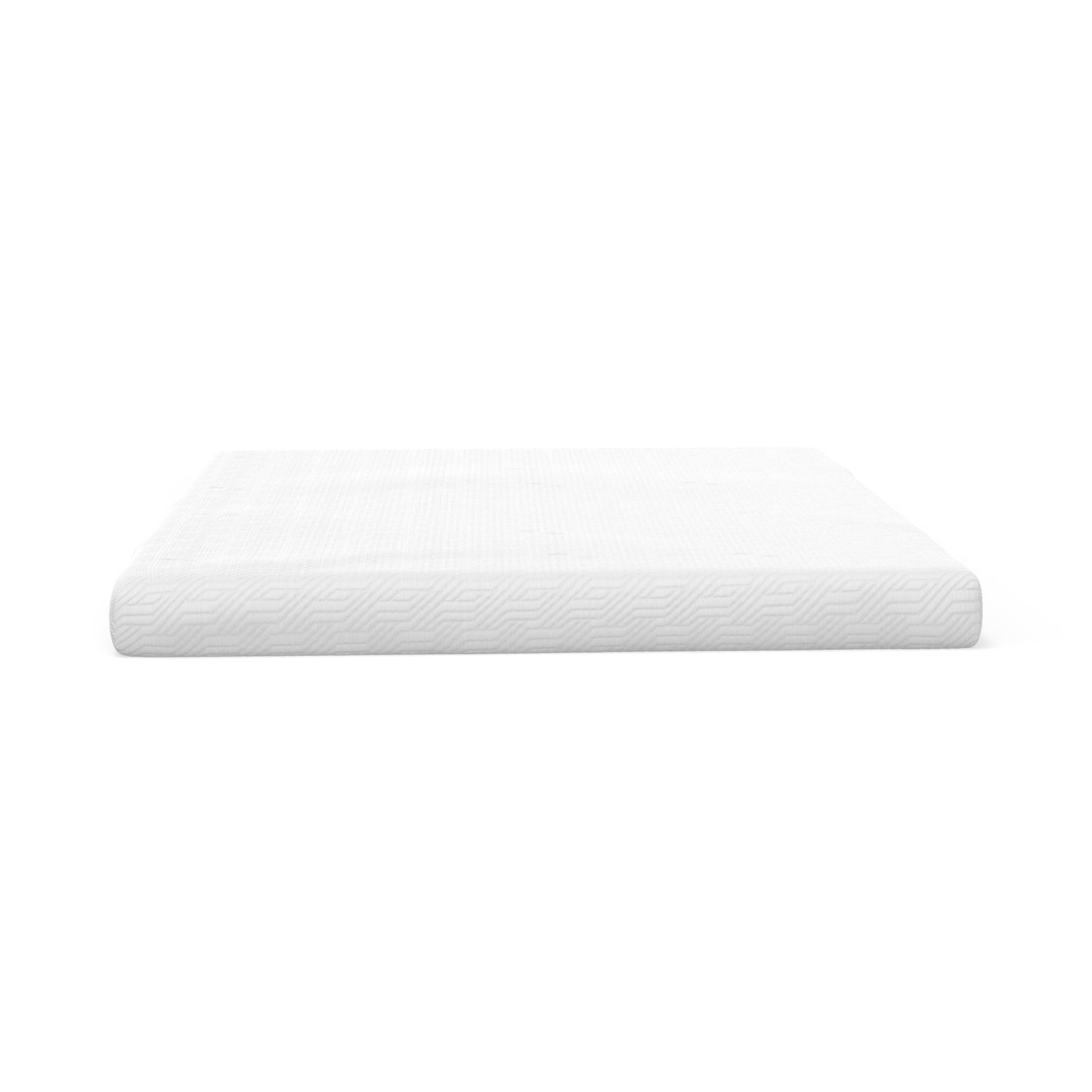 White upholstered mattress with textured geometric pattern on the side