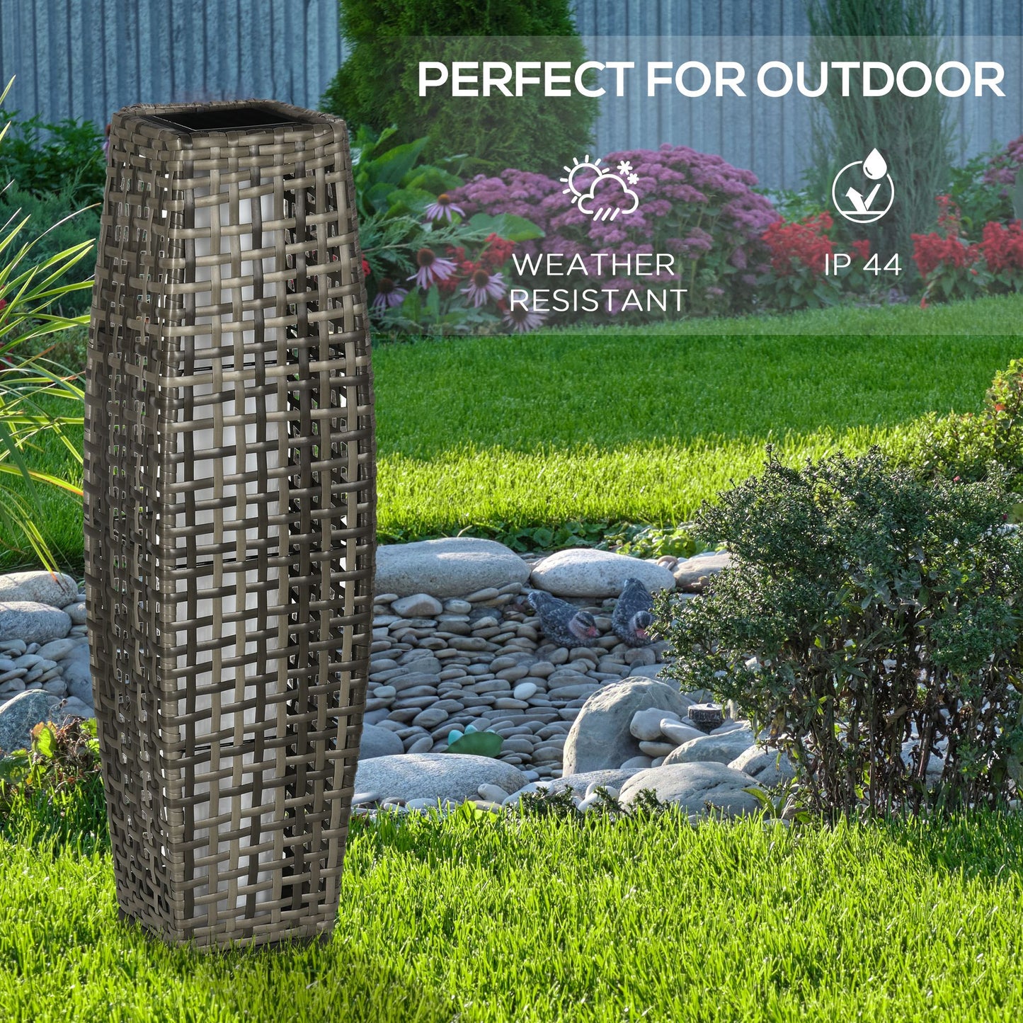 Tall wicker outdoor lantern with a solar top ideal for garden ambiance
