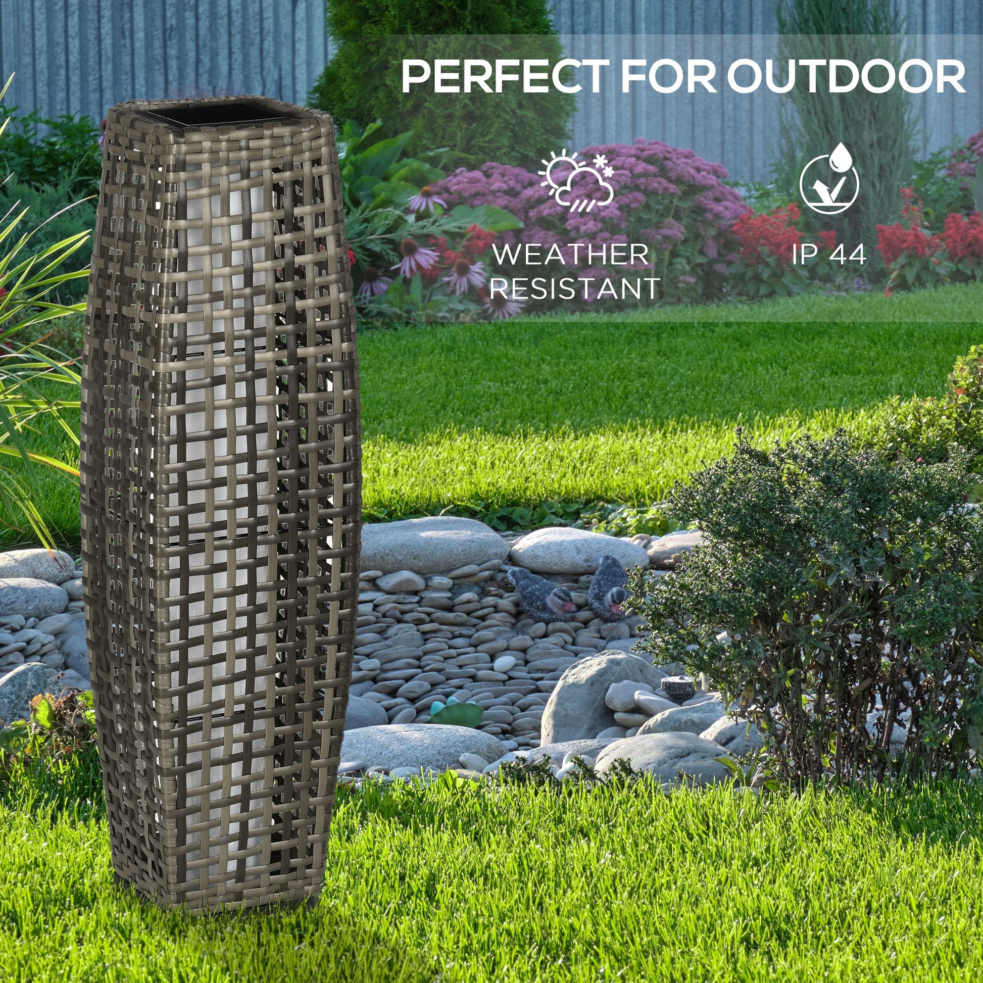 Tall wicker outdoor lantern with a solar top ideal for garden ambiance