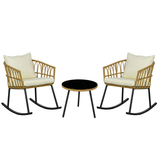 Wicker rocking chairs with cream cushions and black metal bases paired with a round black glass coffee table