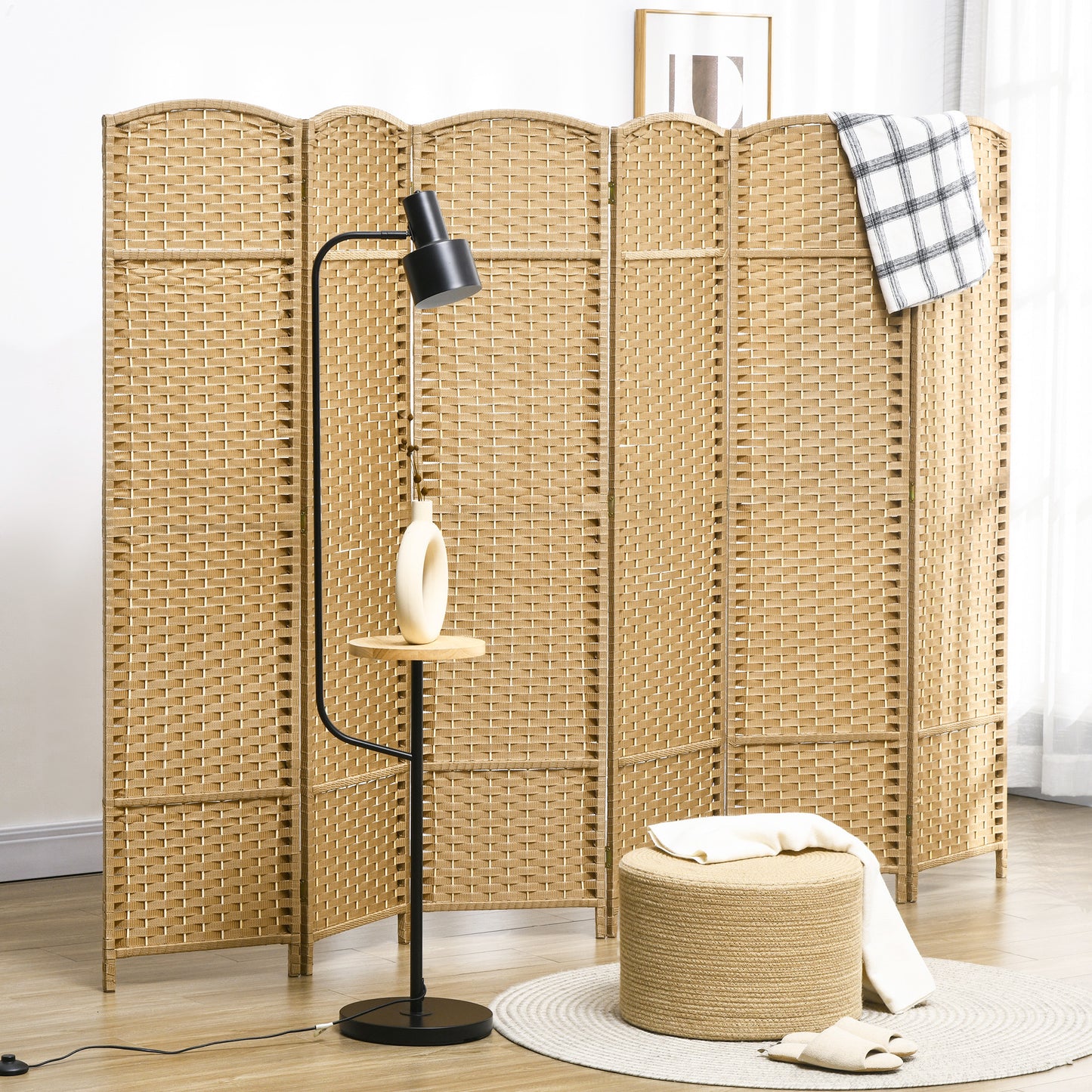 Fourpanel woven room divider in a natural wicker finish ideal for creating privacy