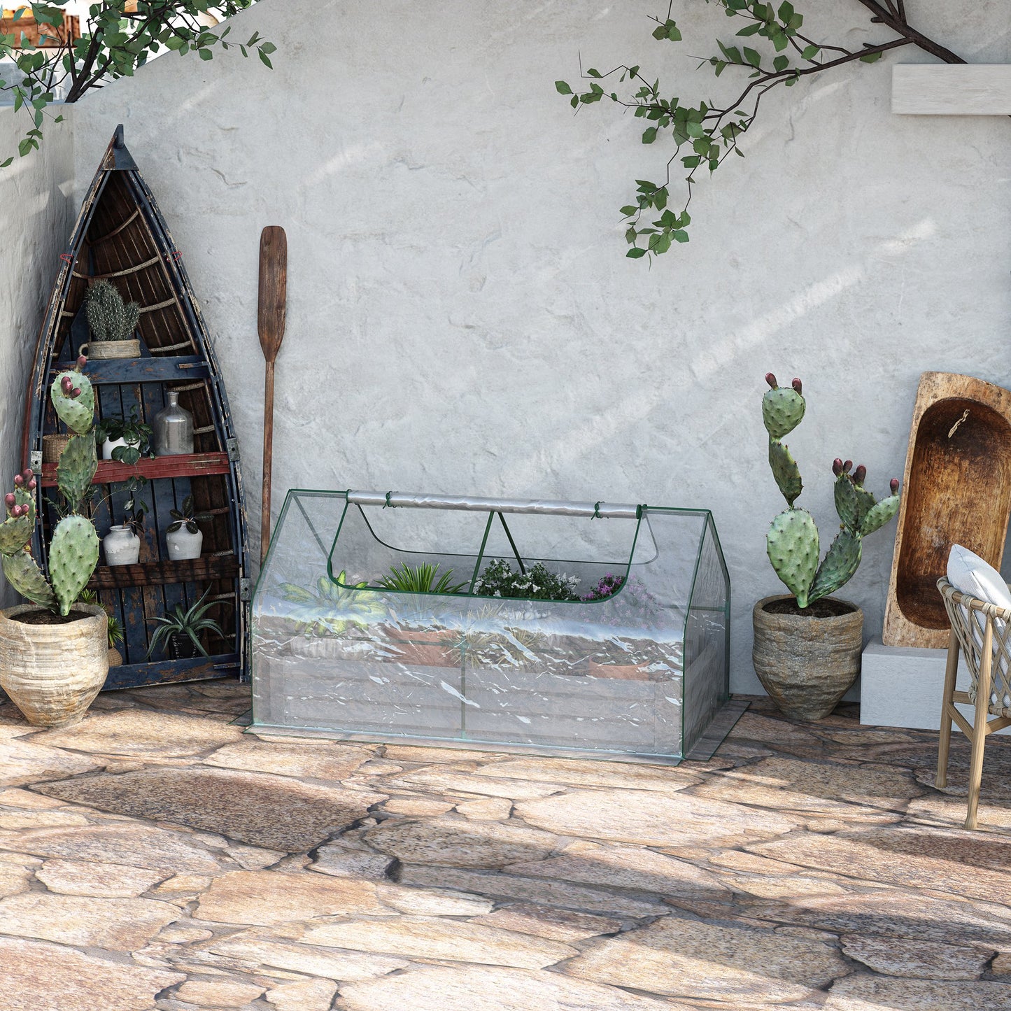 Small portable greenhouse with transparent cover and green trim for seed starting