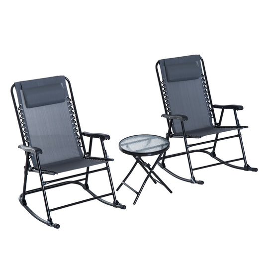 Two grey zero gravity chairs with a round glasstop folding table