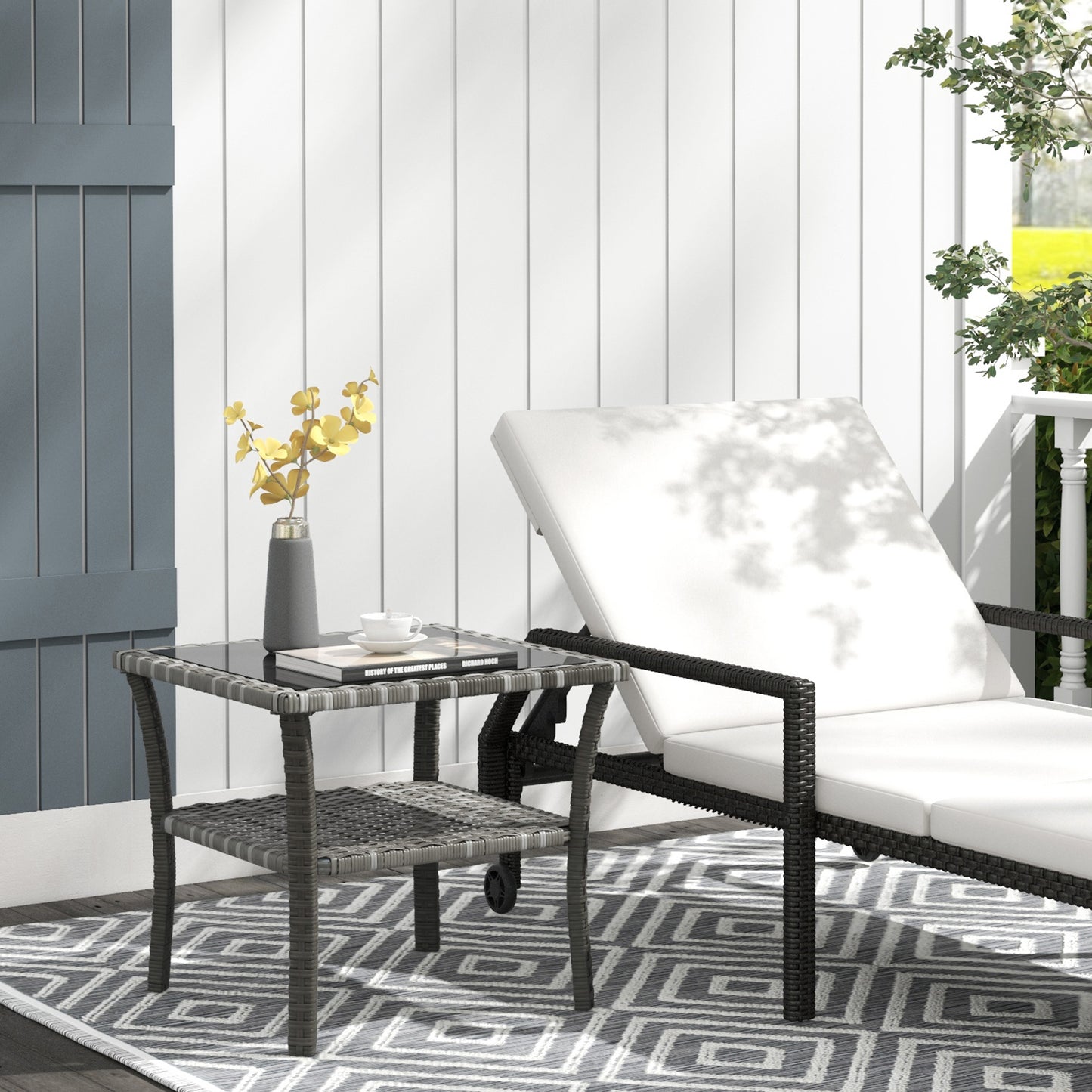 Dark gray wicker side table with glass top and lower shelf perfect for patio furniture