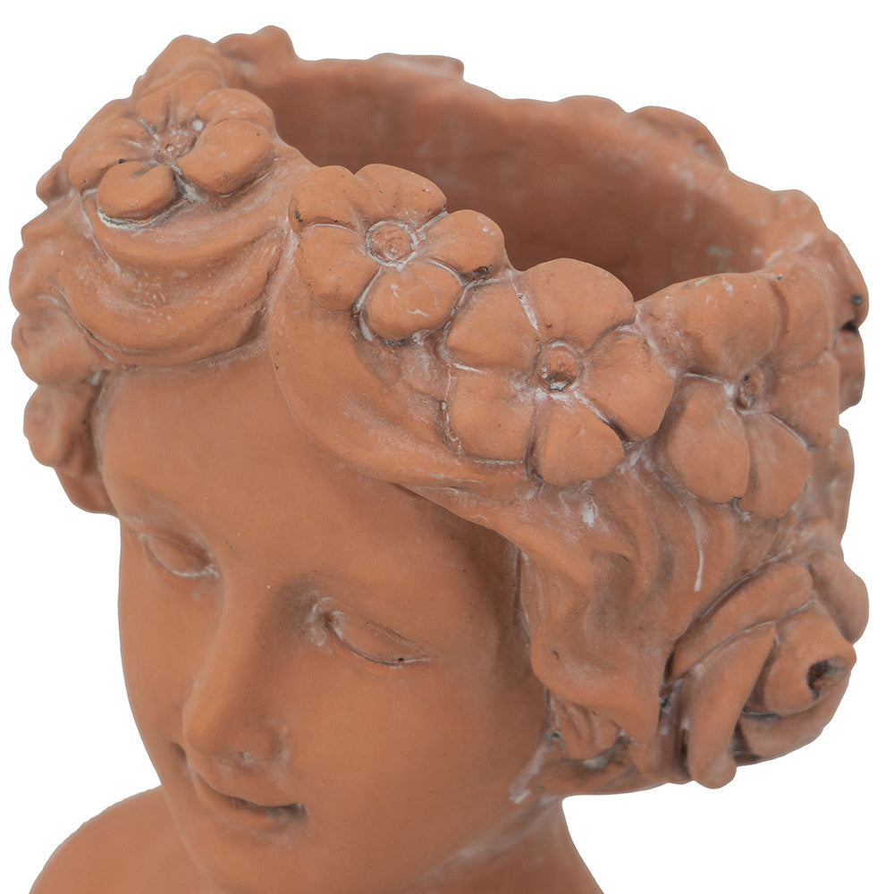 Terracotta cherub planter with floral wreath detail ideal for small succulents