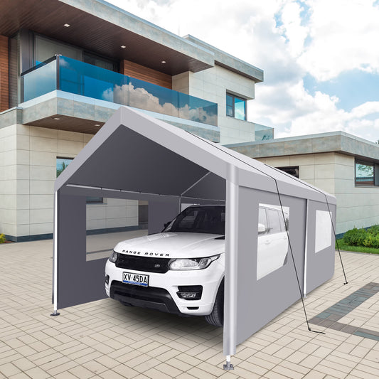 Gray portable carport housing a white Range Rover SUV for outdoor vehicle protection