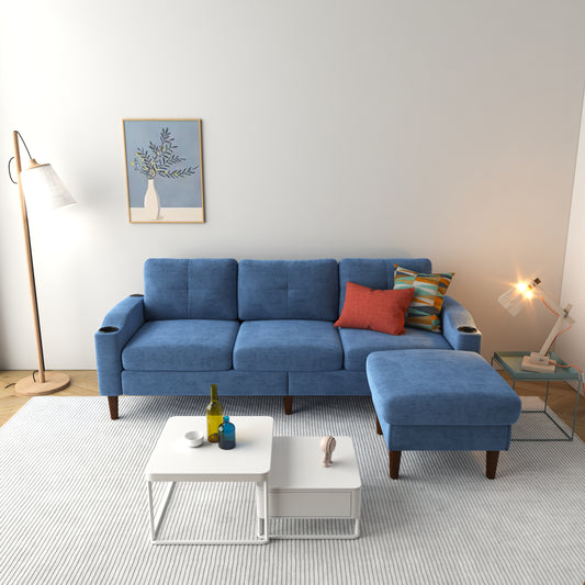 Comfortable blue velvet sofa with plush seating and integrated cup holders