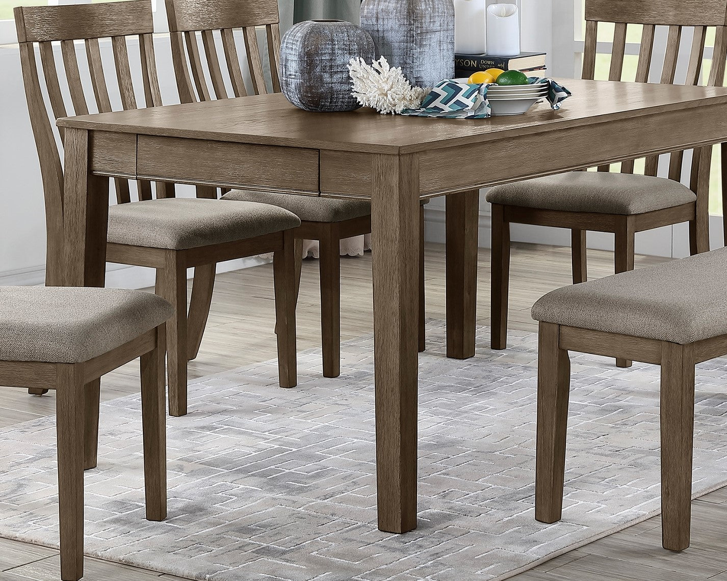 Rustic oak dining table with four matching chairs