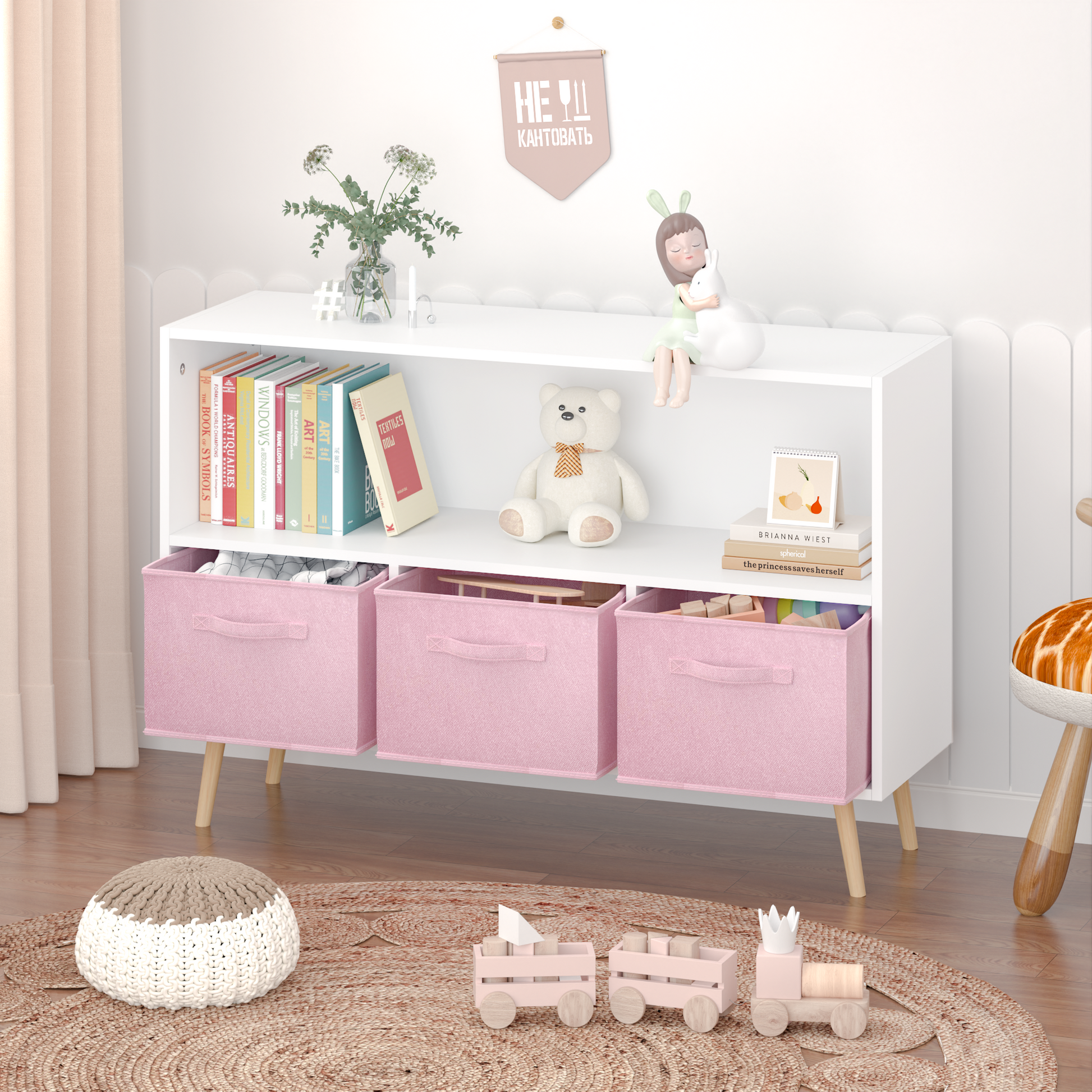 White modern bookcase with pink storage bins and wooden legs