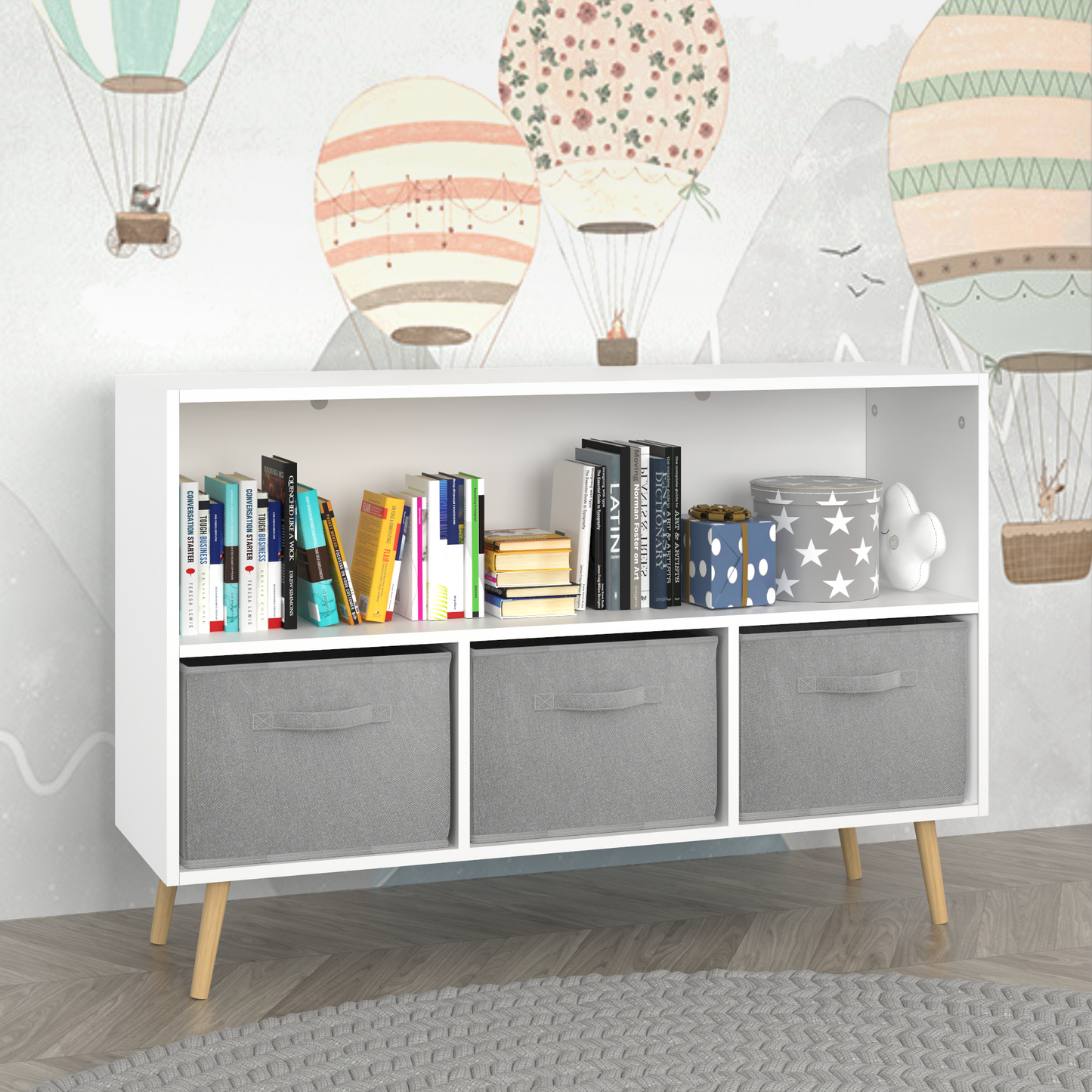 White bookshelf with three grey fabric storage cubes and wooden legs