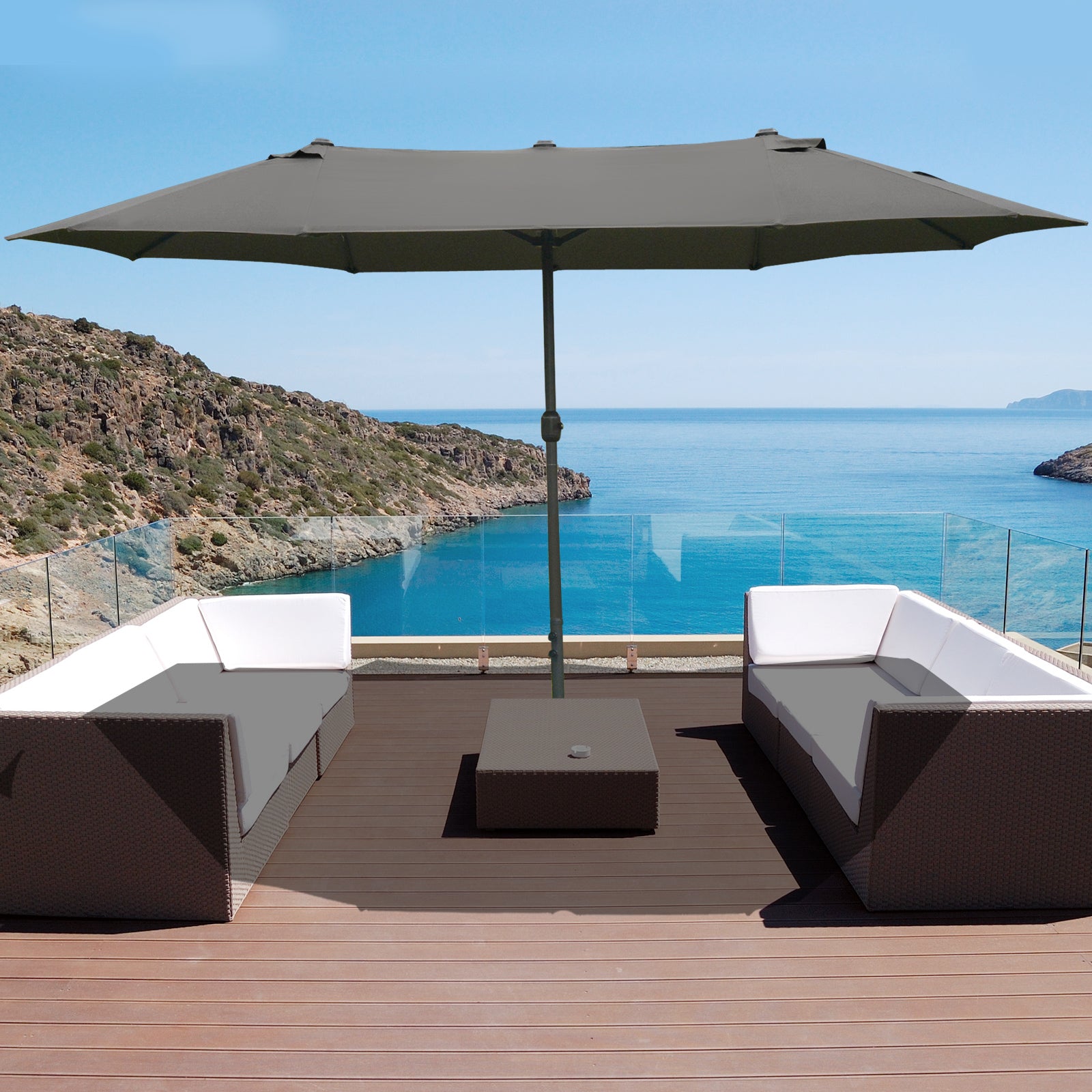 Rectangular cantilever patio umbrella with a dark grey canopy and dark brown rattan furniture set