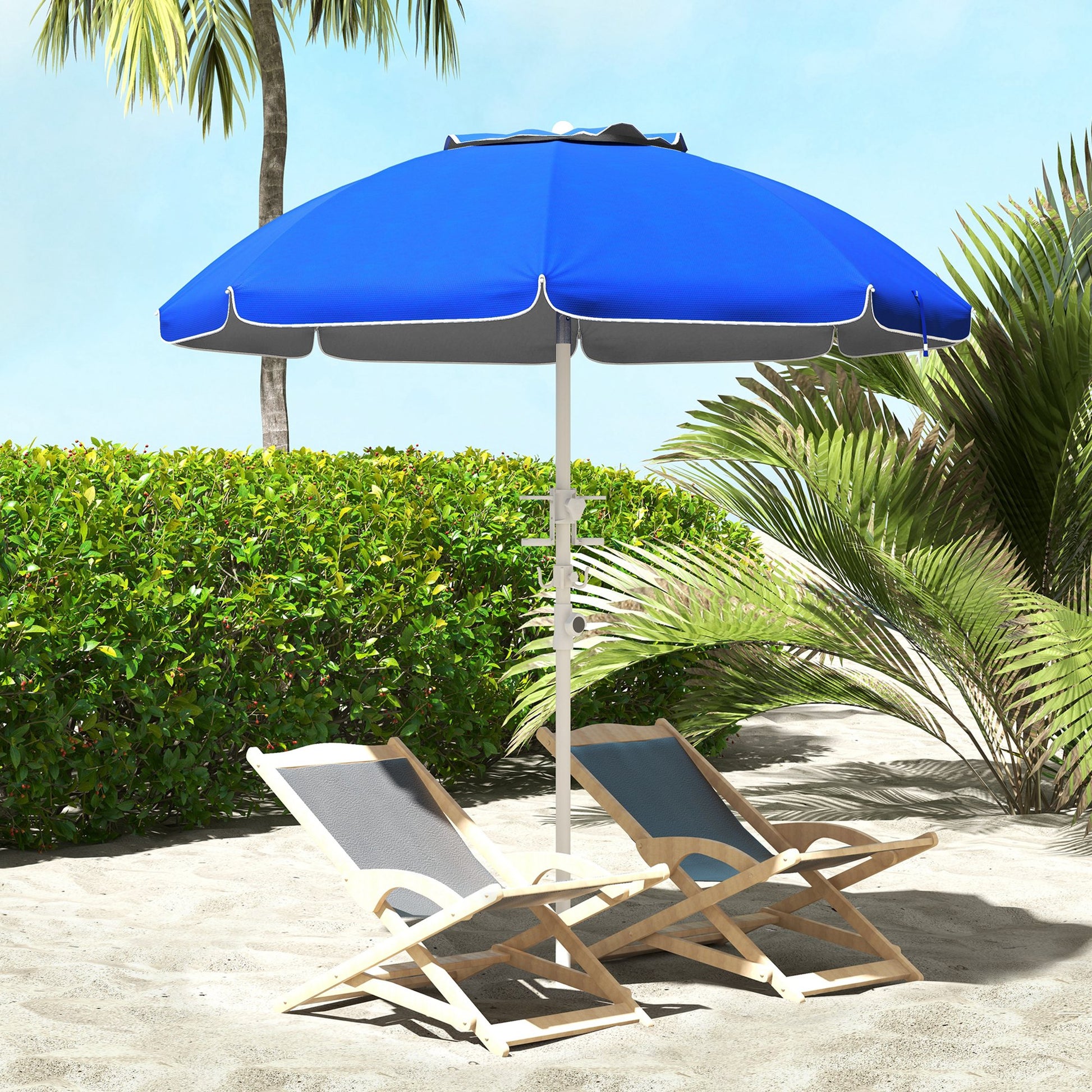 Two wooden beach chairs with blue fabric seats sit under a large blue umbrella on a sandy beach