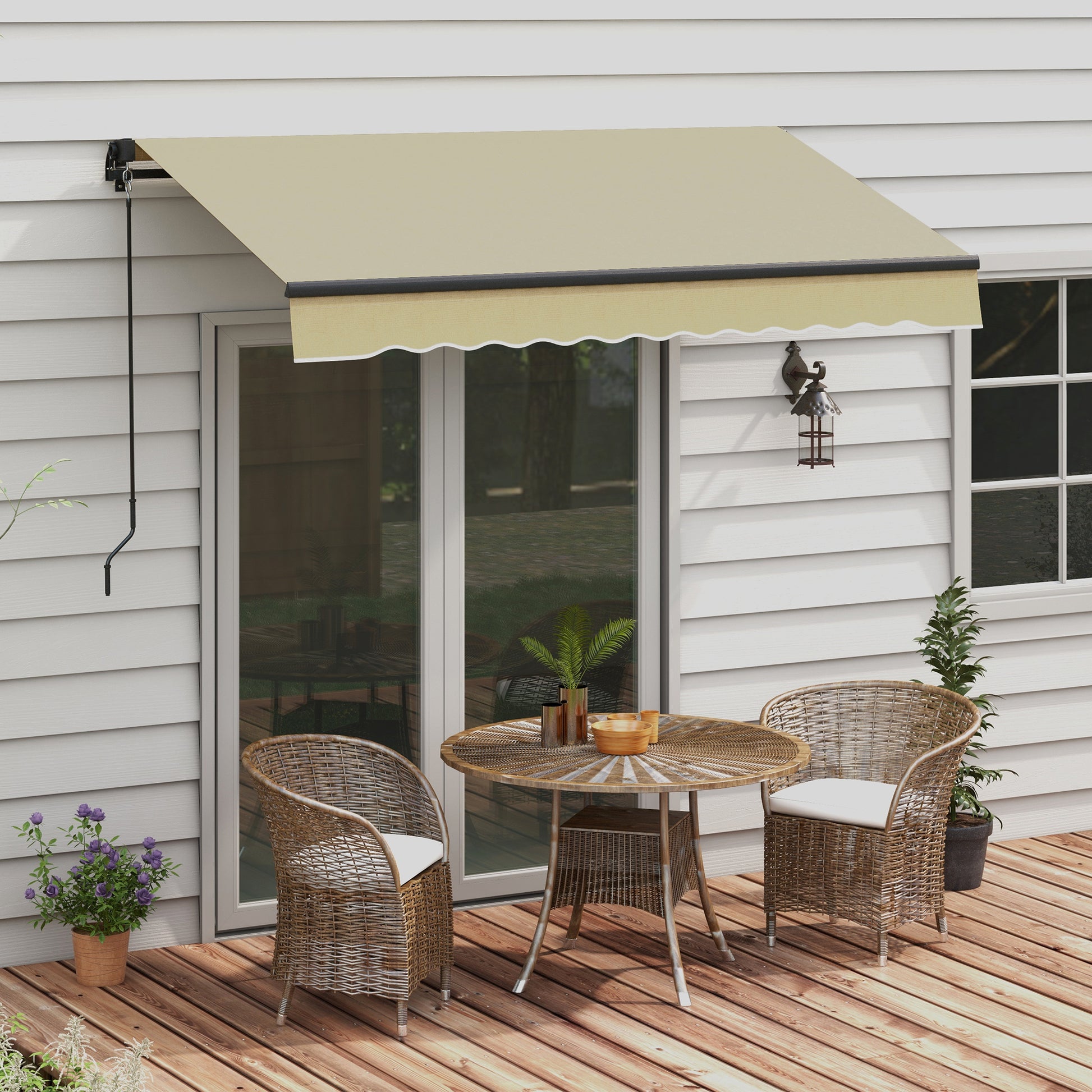 Beige retractable patio awning extended over a deck providing shade for outdoor furniture