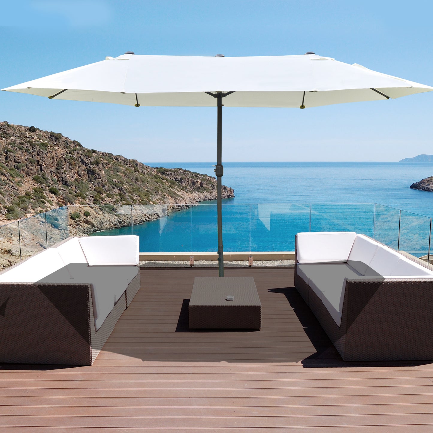 White octagonal patio umbrella with dark pole providing shade over outdoor furniture