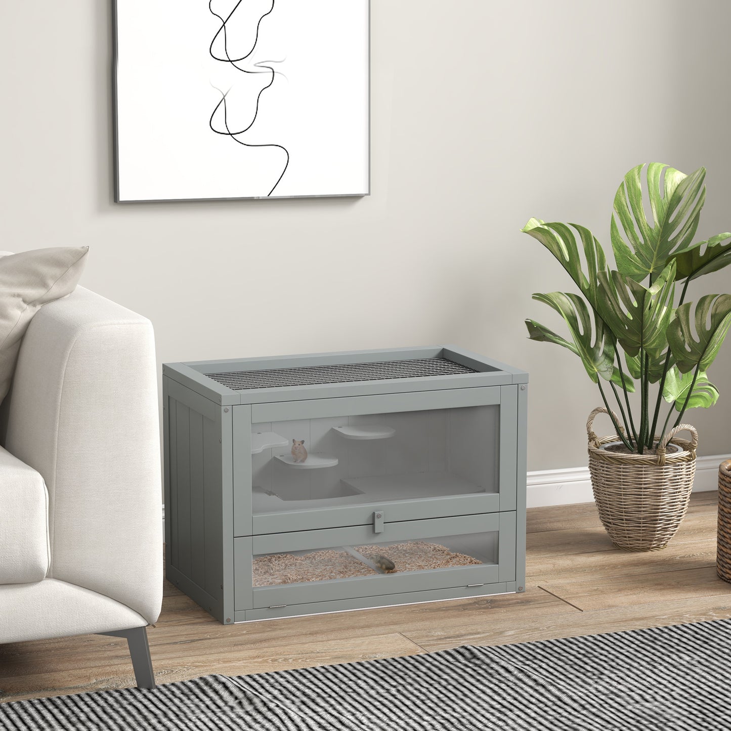 Gray wooden hamster cage with clear glass front featuring multiple levels and a beddingfilled base