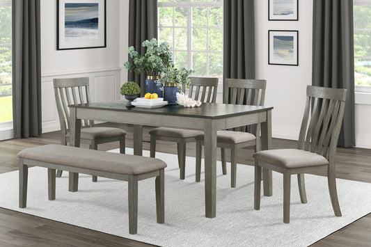 Gray wood dining table with upholstered seats and matching bench