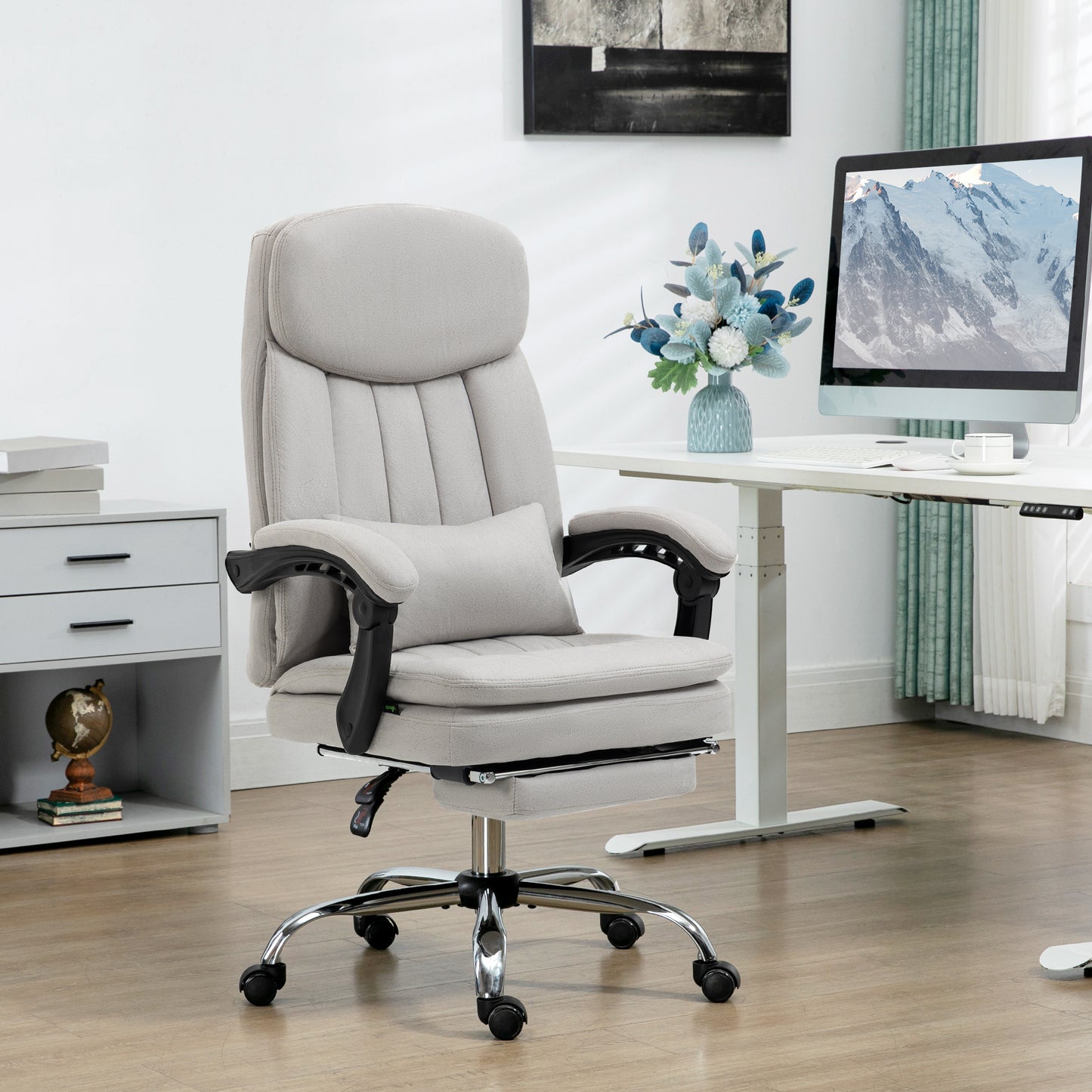 Ergonomic executive office chair in light gray fabric with adjustable lumbar support and footrest