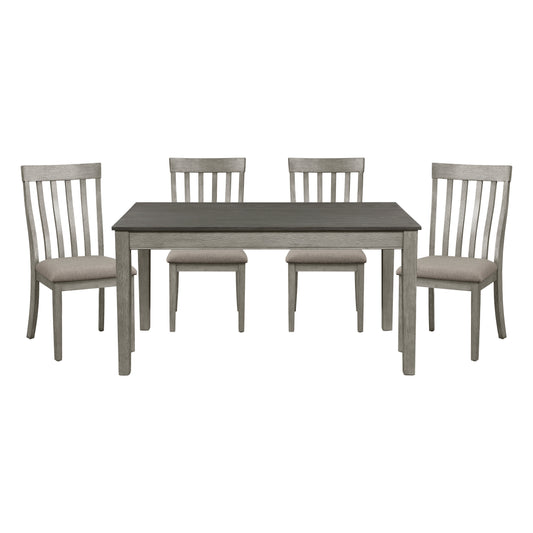 Gray wood dining table with upholstered chairs