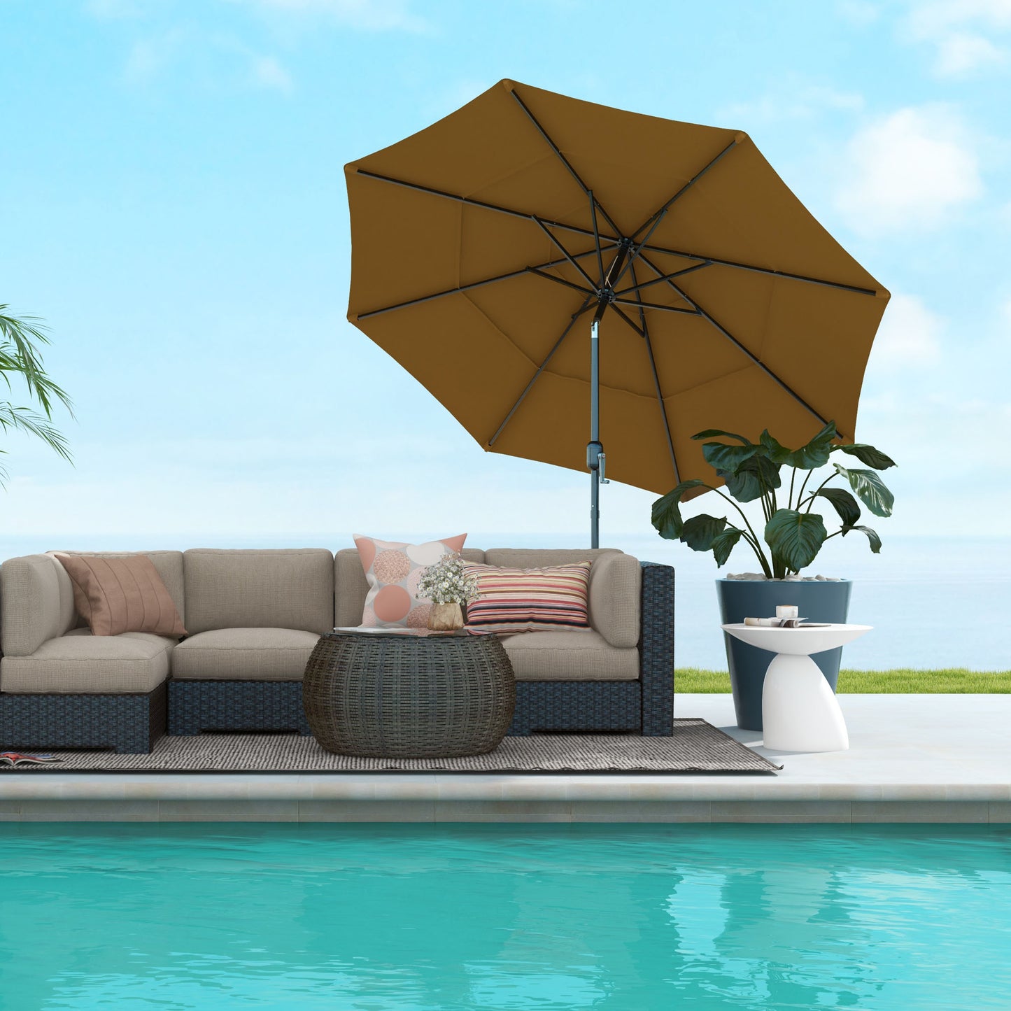 Taupe wicker sectional outdoor sofa with tan cushions and decorative pillows