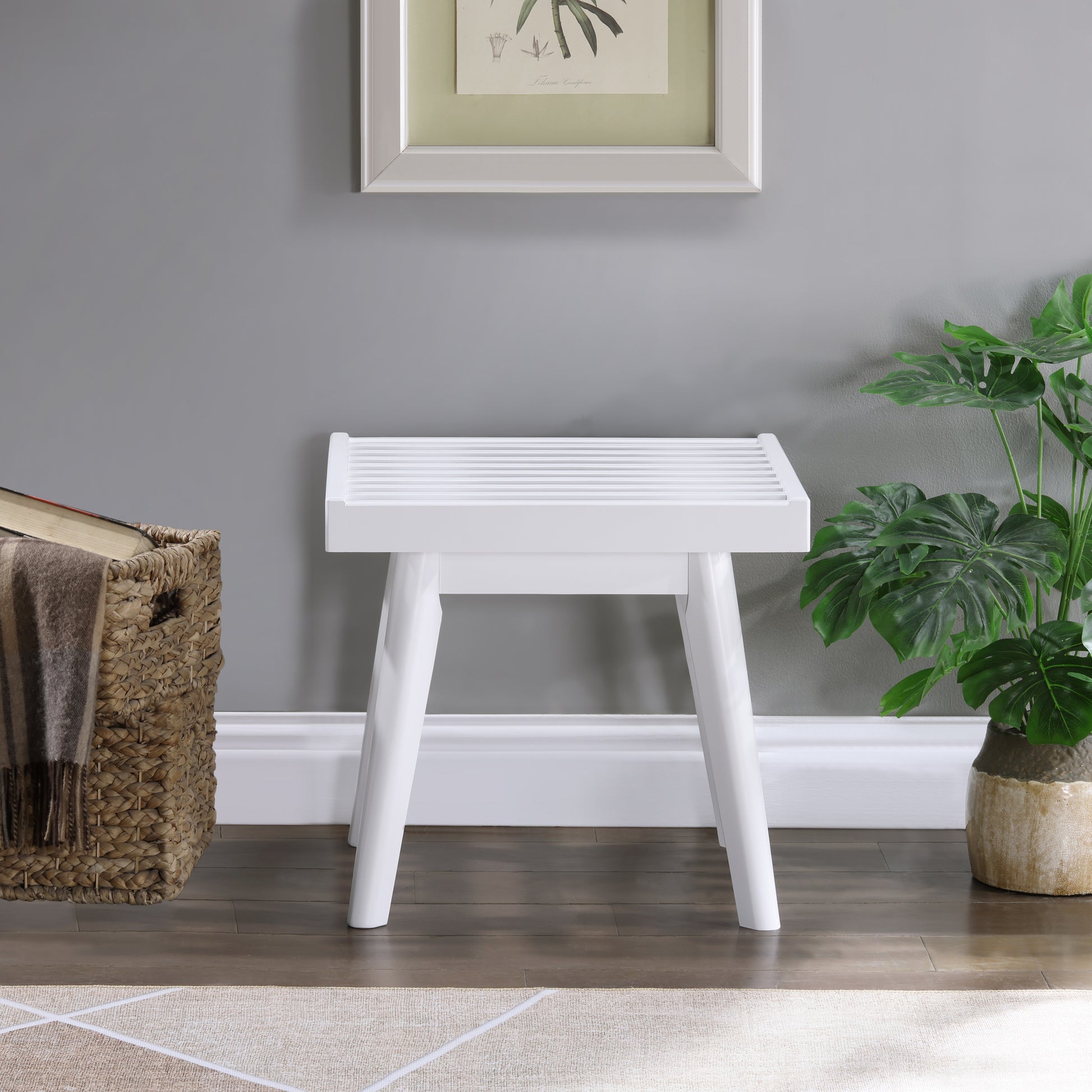 White modern wooden stool with slatted top and tapered legs