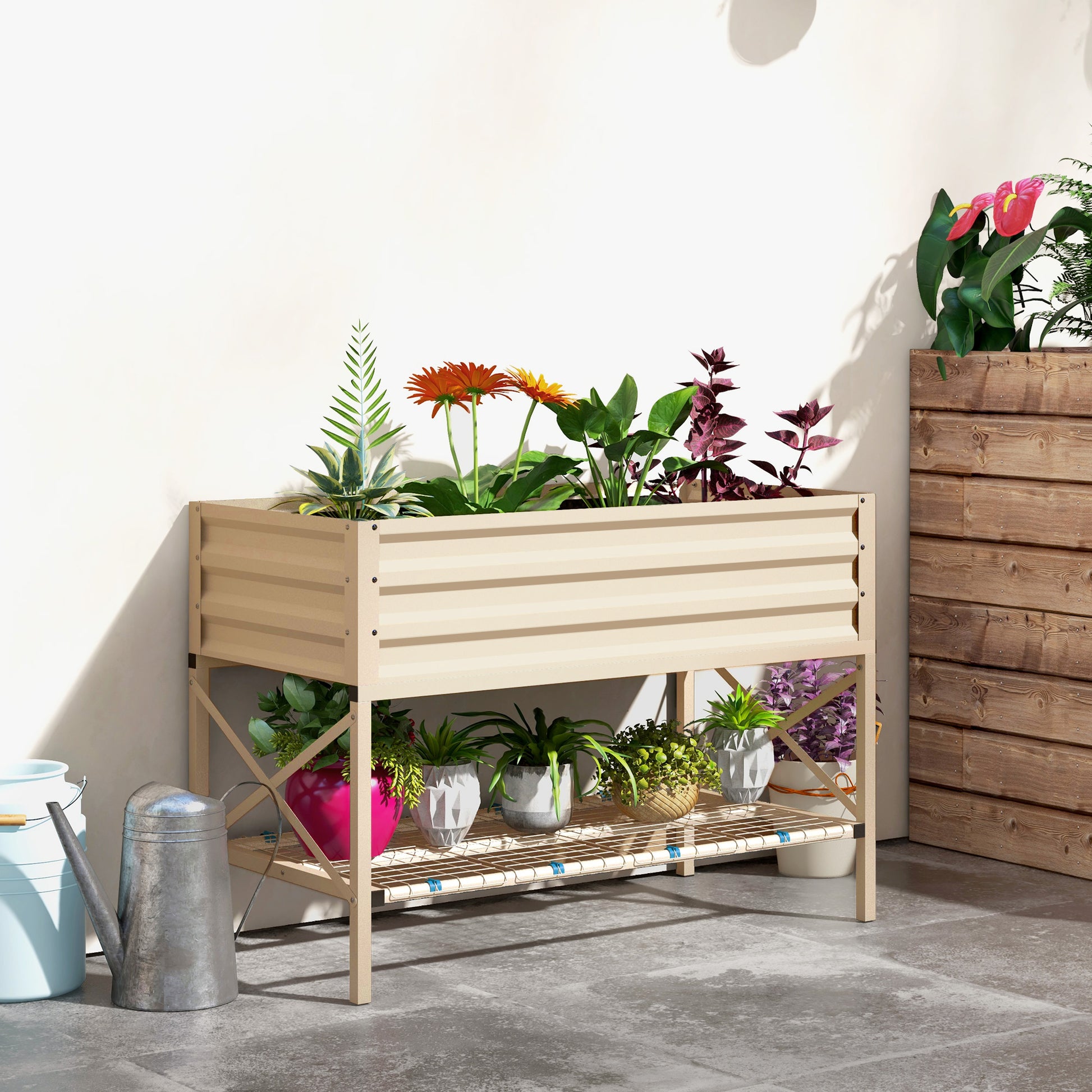 Tan metal raised garden bed with two shelves holding various potted plants