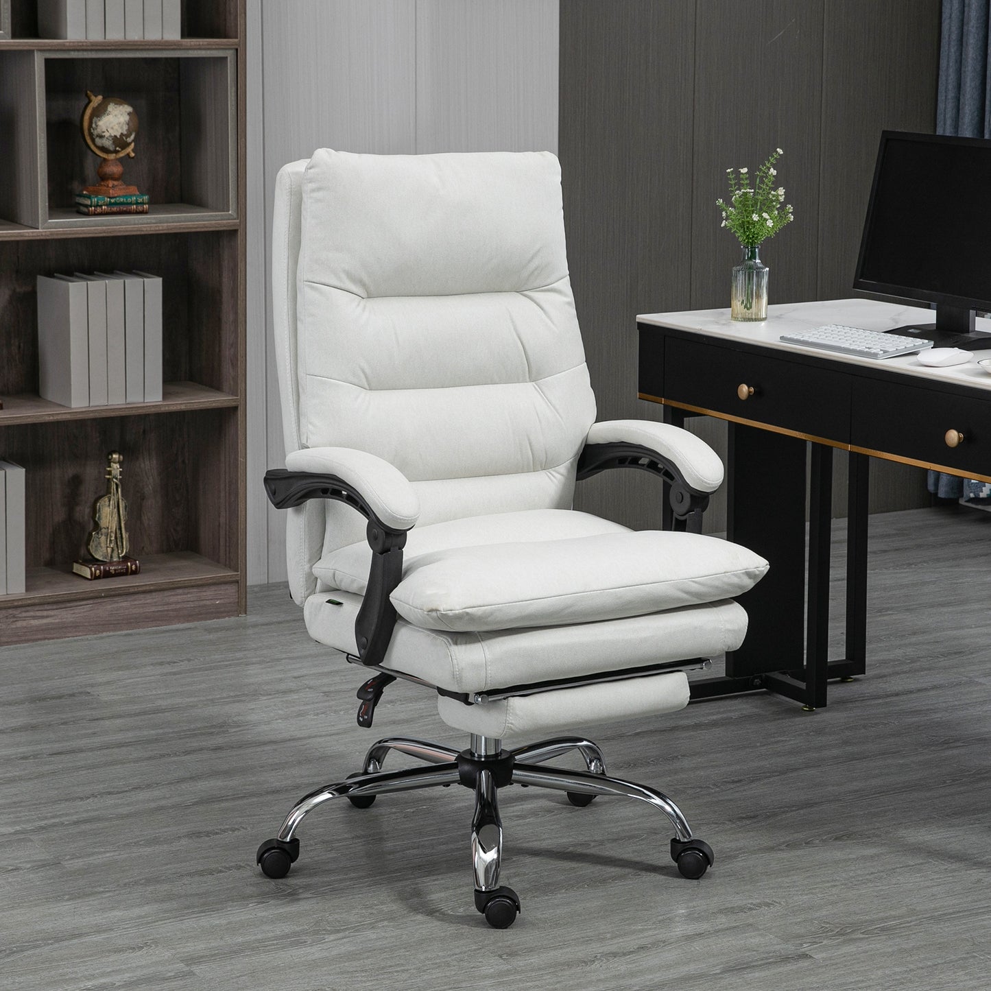 Ergonomic white office chair with adjustable footrest and padded seat for comfort