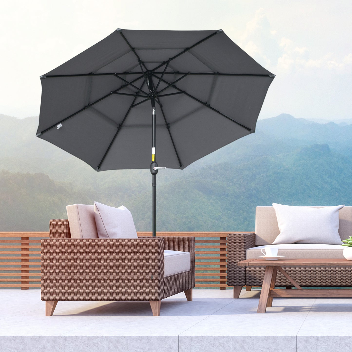 Dark gray outdoor patio umbrella with crank lift on a balcony