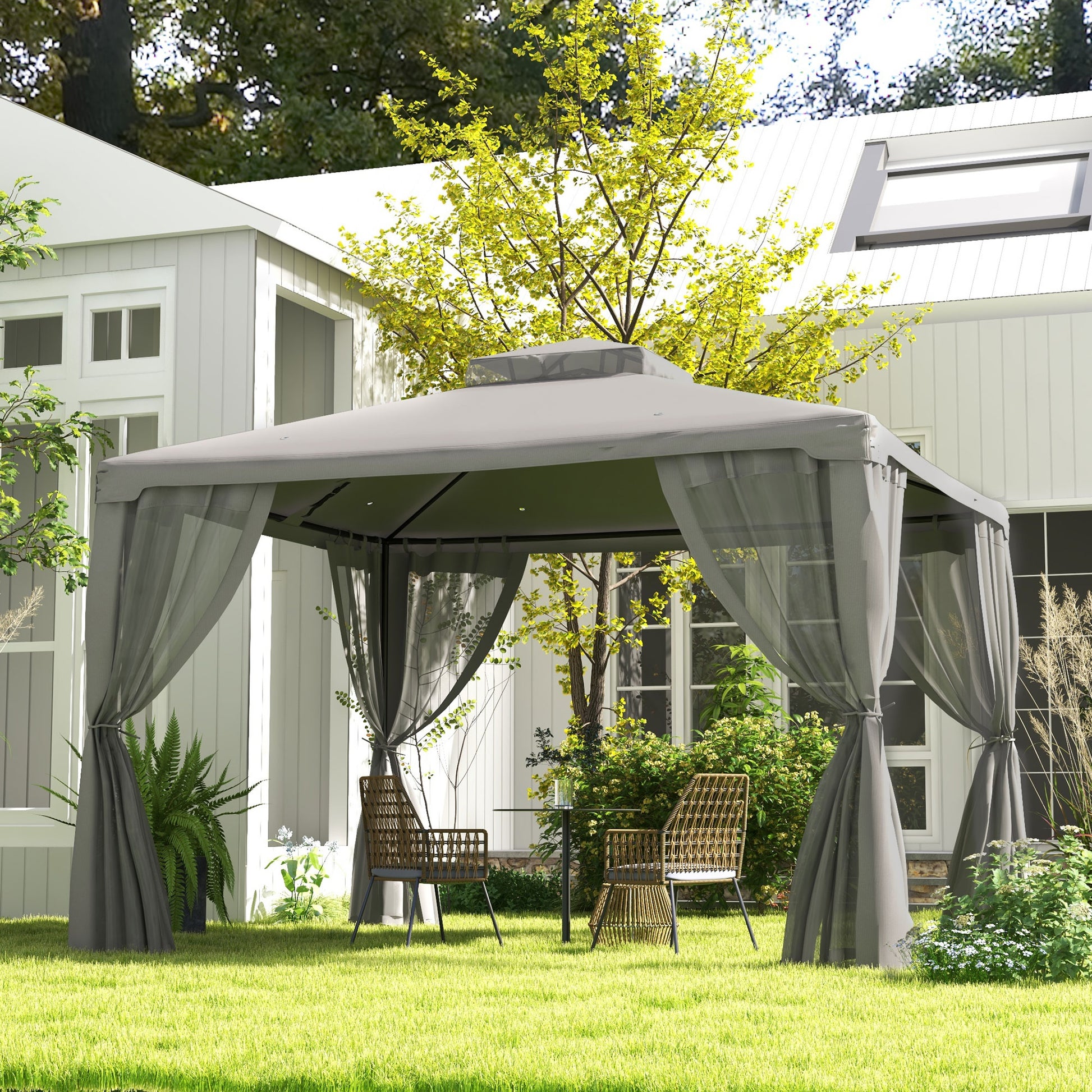 Grey outdoor gazebo with sheer curtains offering shaded patio relaxation