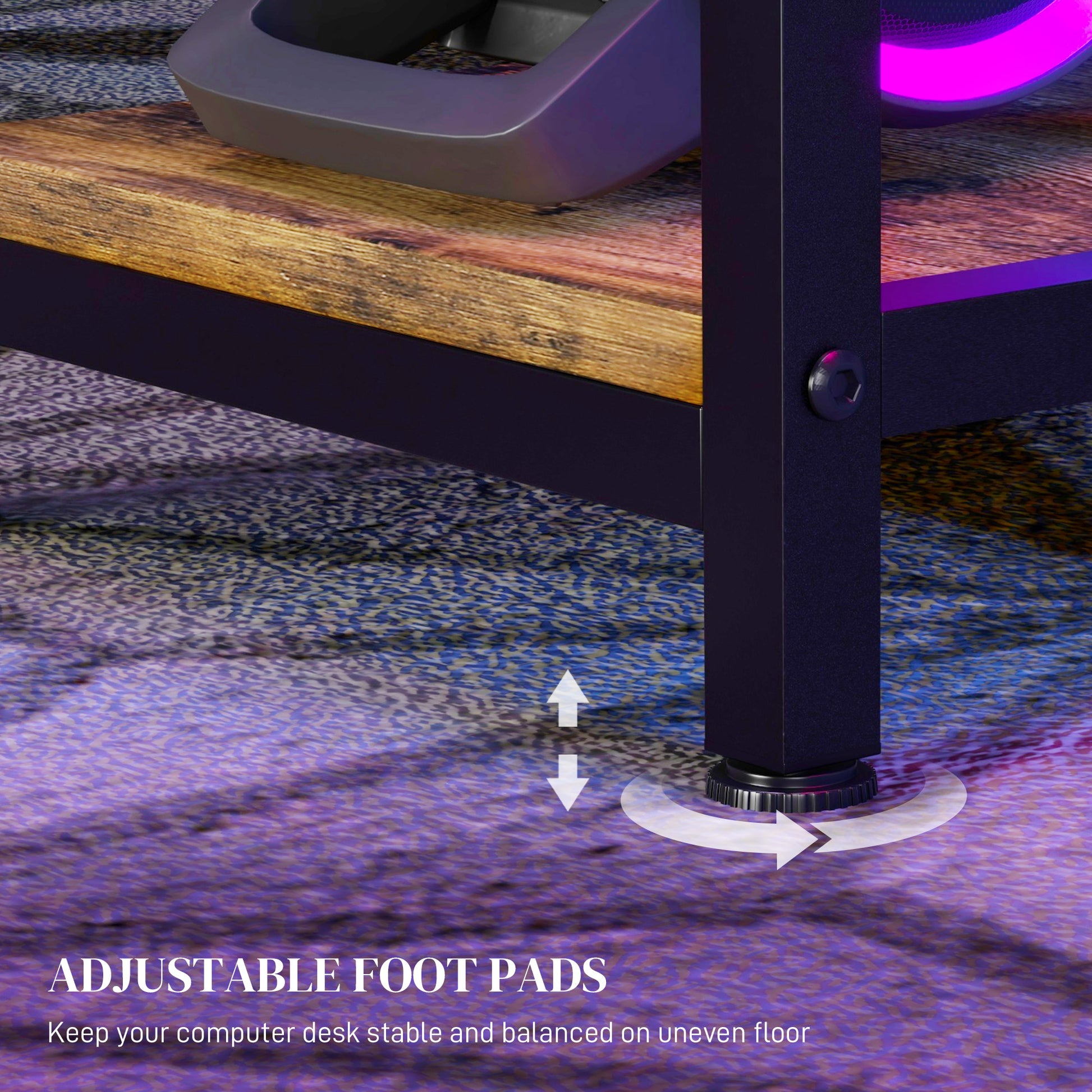 Adjustable foot pad on a black metal desk leg showing height adjustment for stability