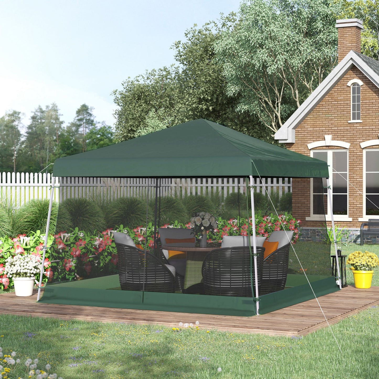 Dark green popup canopy with netting providing shade for patio furniture