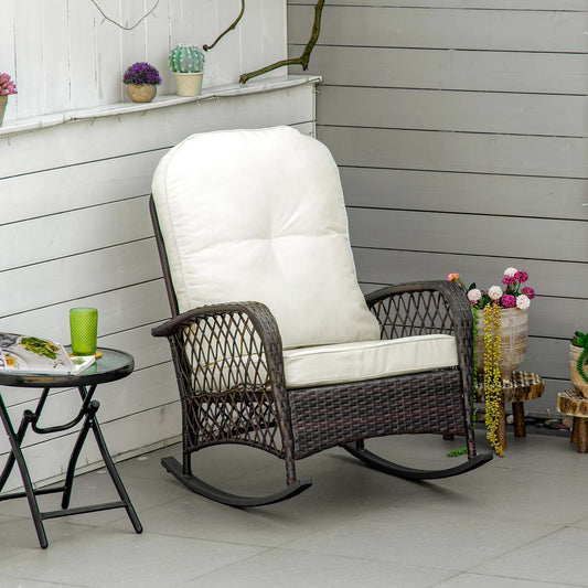 Dark brown rattan rocking chair with plush cream cushions ideal for patio relaxation