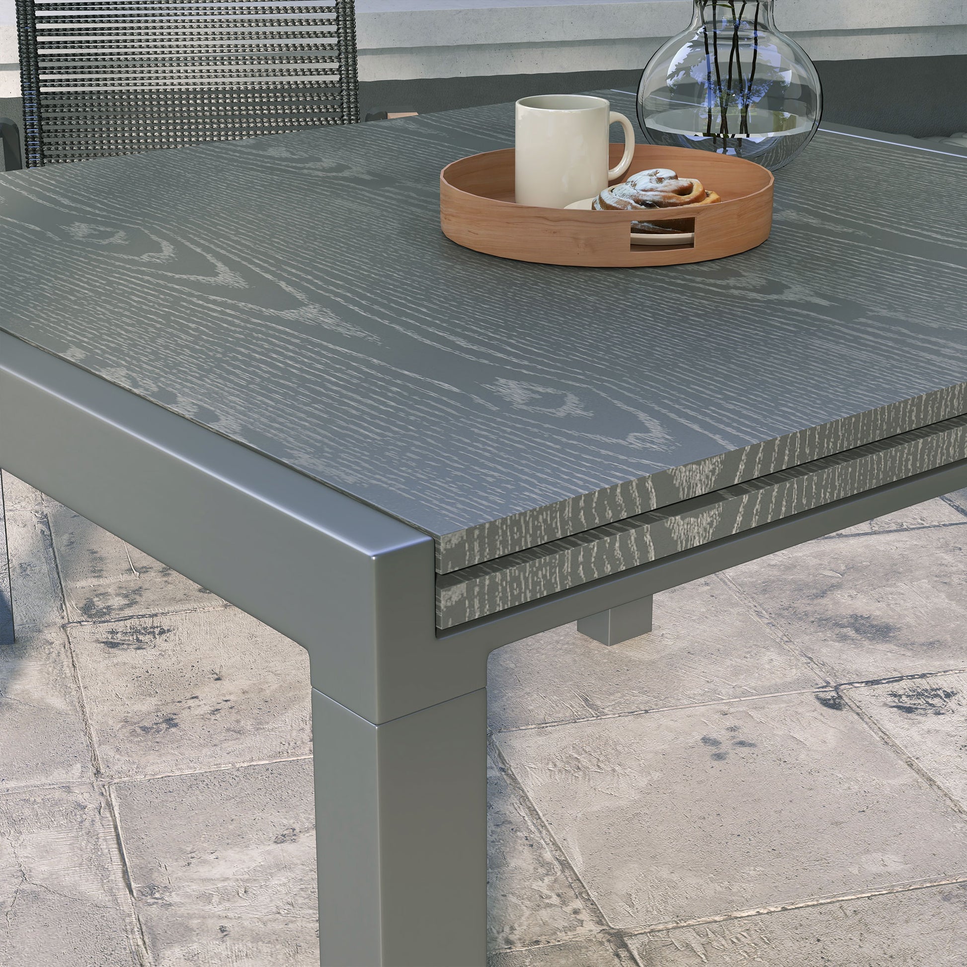 Modern grey wood grain outdoor dining table with metal frame