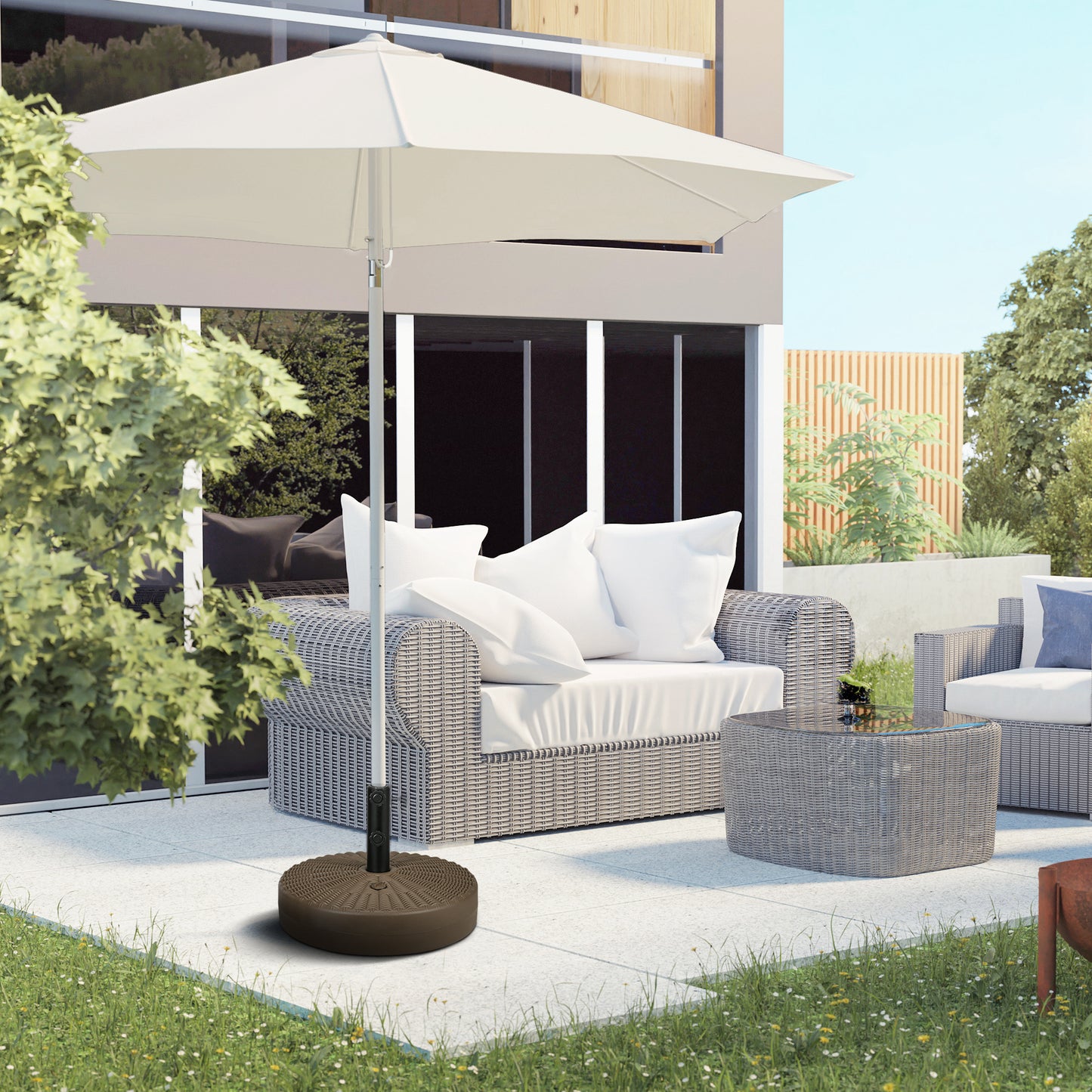 Large white patio umbrella with a woven brown base and outdoor seating
