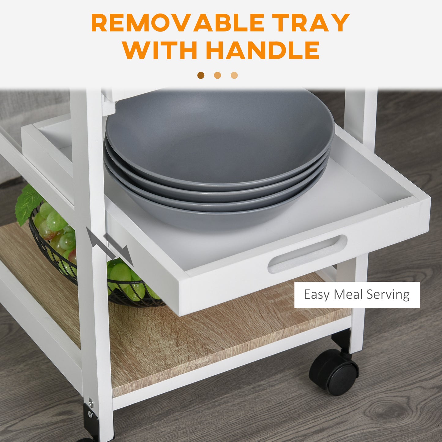 White kitchen cart with removable tray holding grey plates and basket of green grapes
