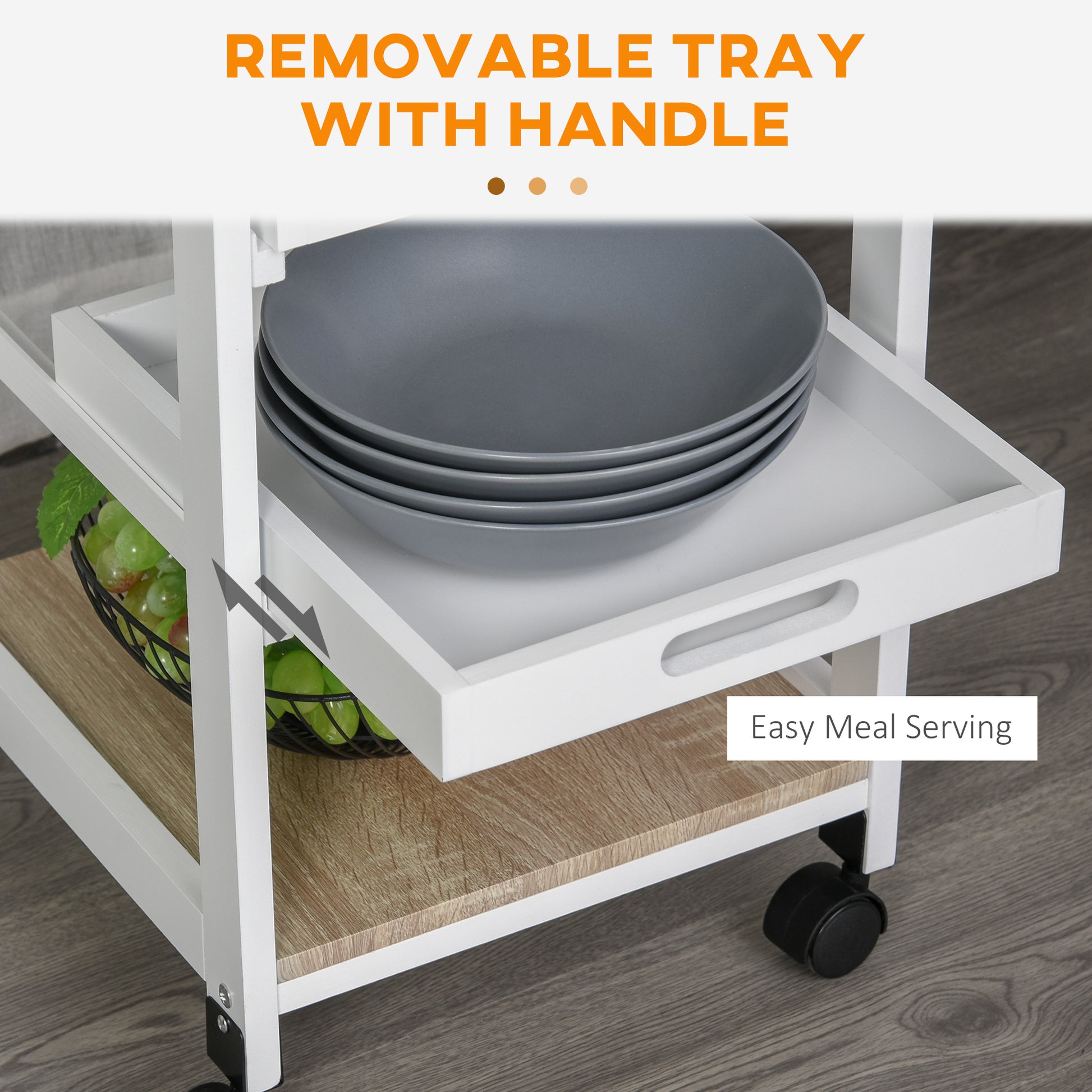 White kitchen cart with removable tray holding grey plates and basket of green grapes