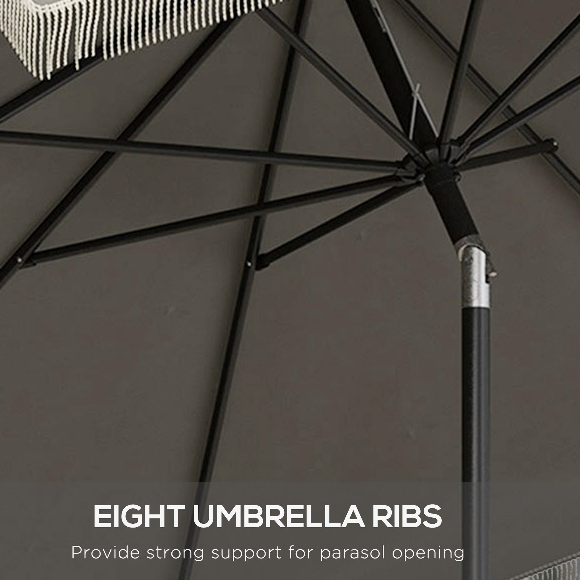 Closeup of gray patio umbrella fabric and metal ribs for strong support
