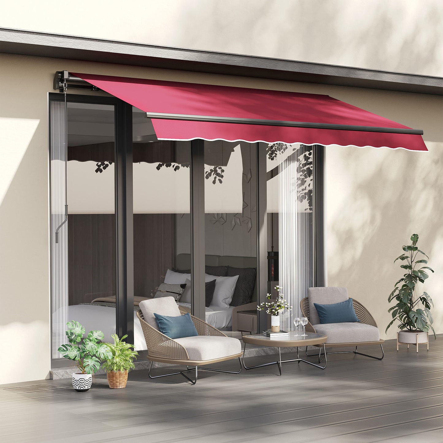 Retractable awning in deep red fabric with white scalloped trim over patio doors
