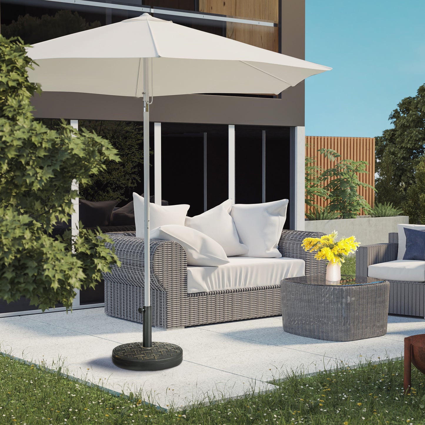 White cantilever patio umbrella with a woven base providing shade over outdoor furniture