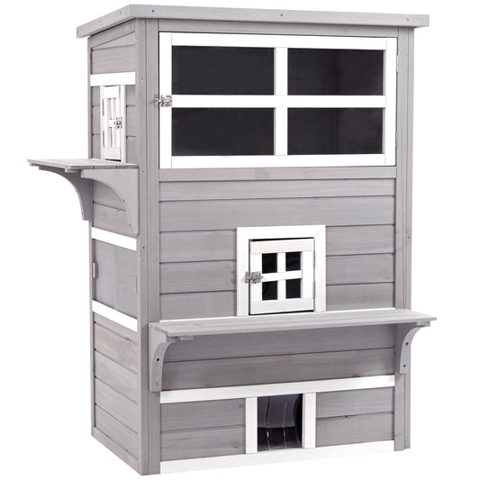 Gray wooden outdoor cat house with multiple levels and window features