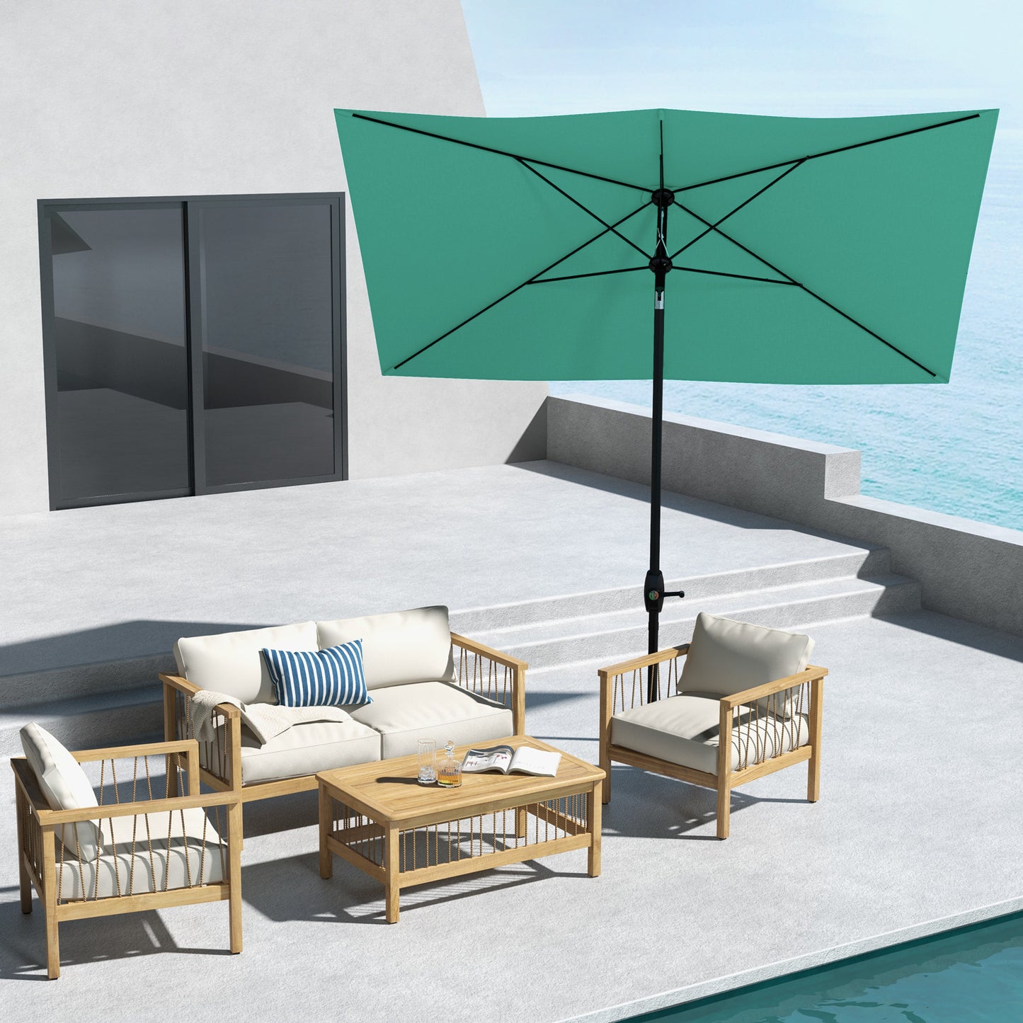Rectangular teal patio umbrella providing shade over a modern outdoor seating set