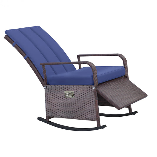 Brown wicker rocking patio chair with navy blue cushions and extended footrest