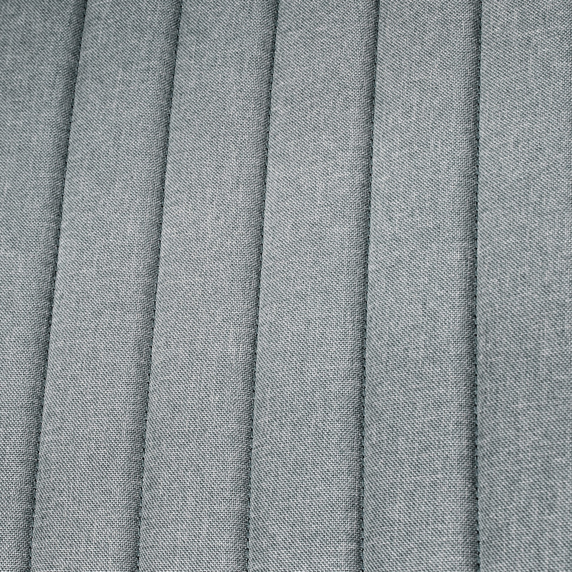 Closeup of grey linen fabric with vertical pleats ideal for upholstery or curtains